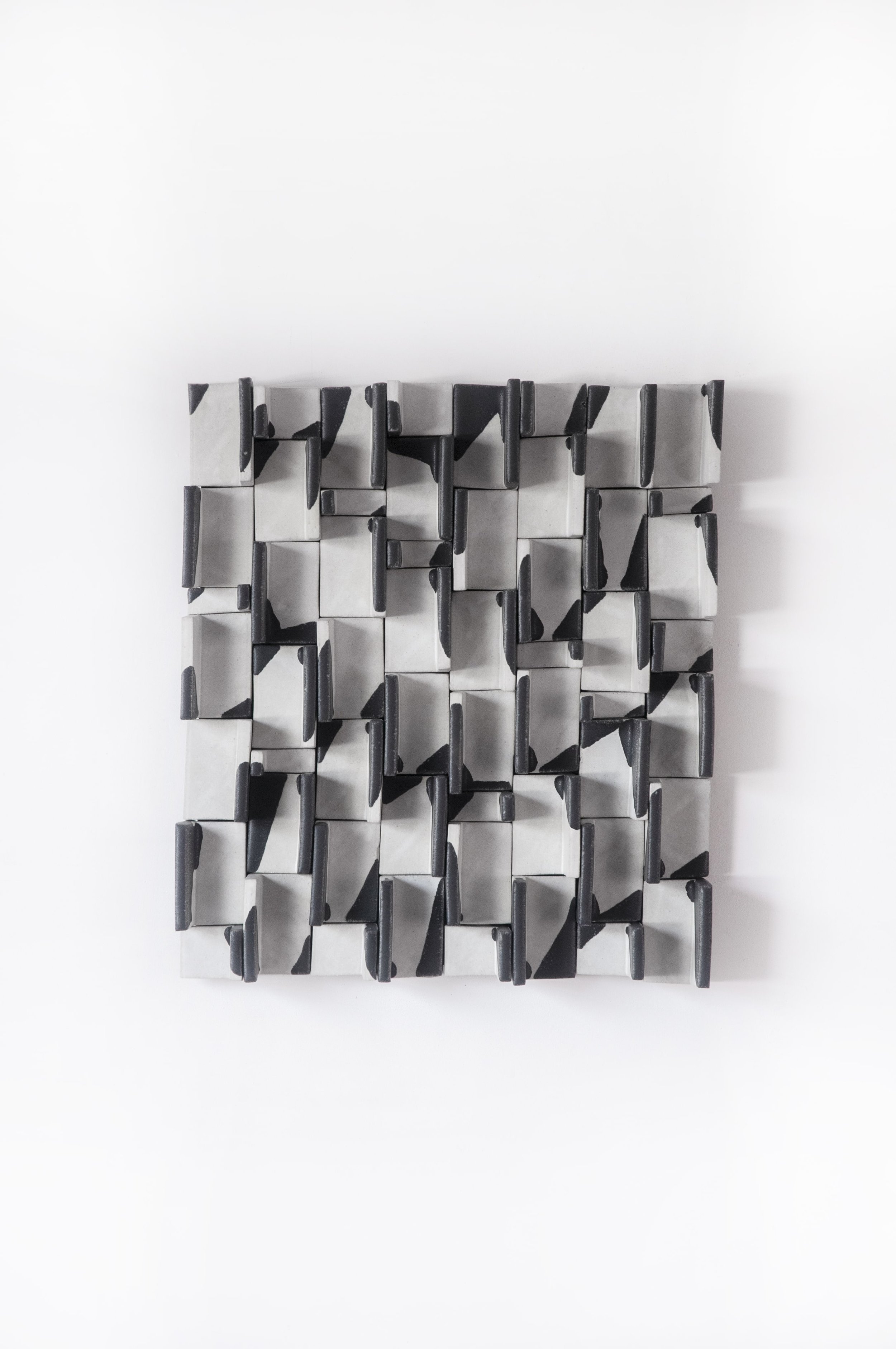 Ben-Medansky-black-white-ceramic-wall-art.jpg