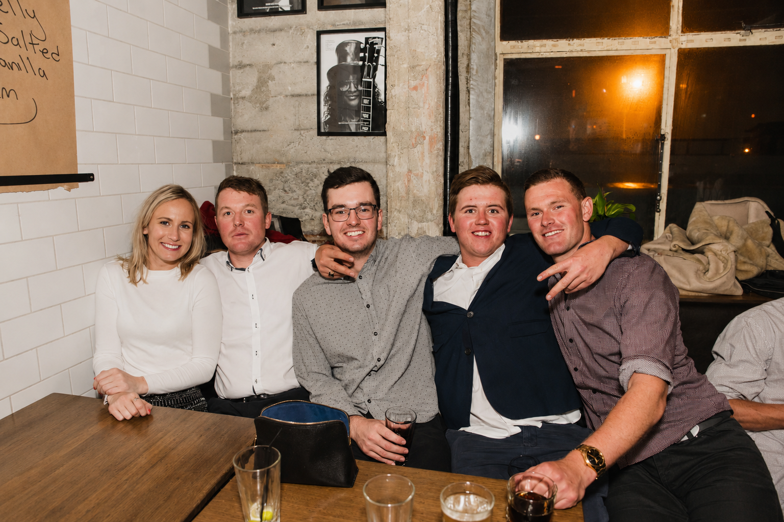 Group of friends celebrating together at Royals in Christchurch