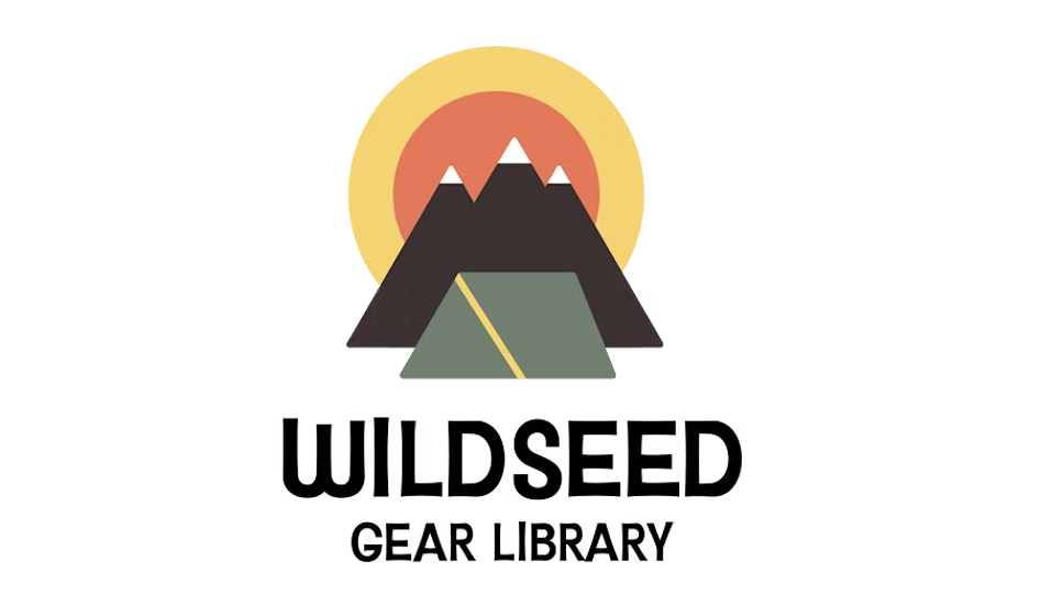 Logo for Wildseed Gear Library featuring stylized mountains, a tent, a sunrise or sunset, and bold text.