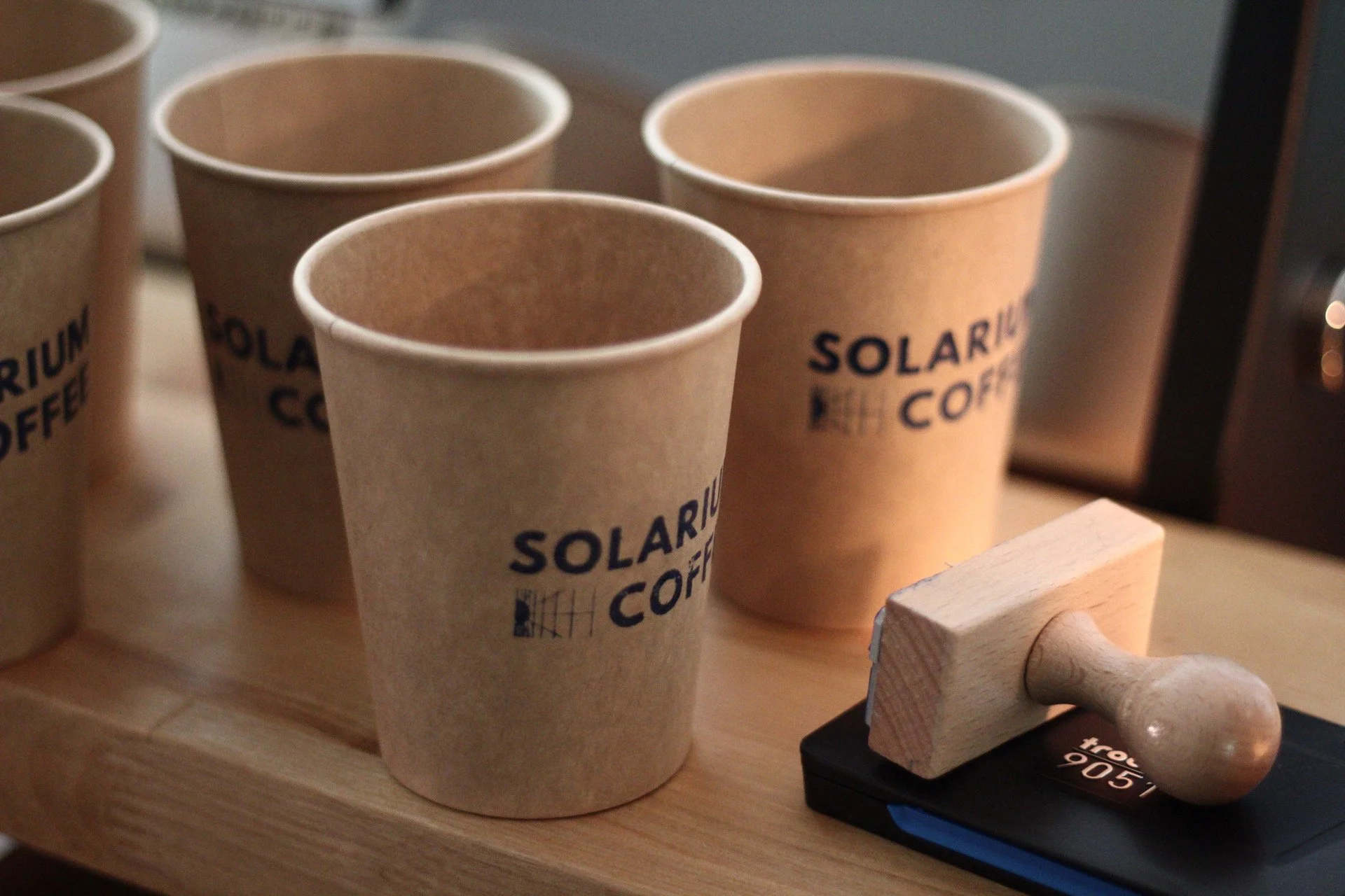 Solarium coffee custom branded cups.