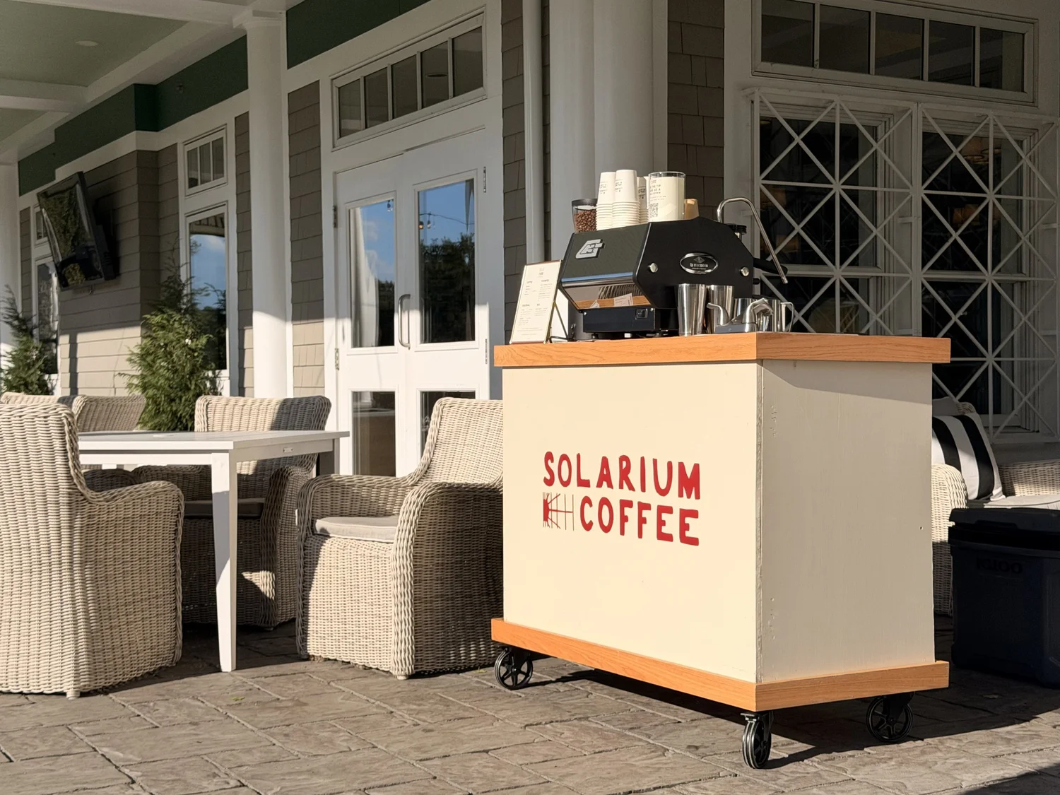 Solarium Coffee mobile espresso cart set up and serving at a MetroWest event