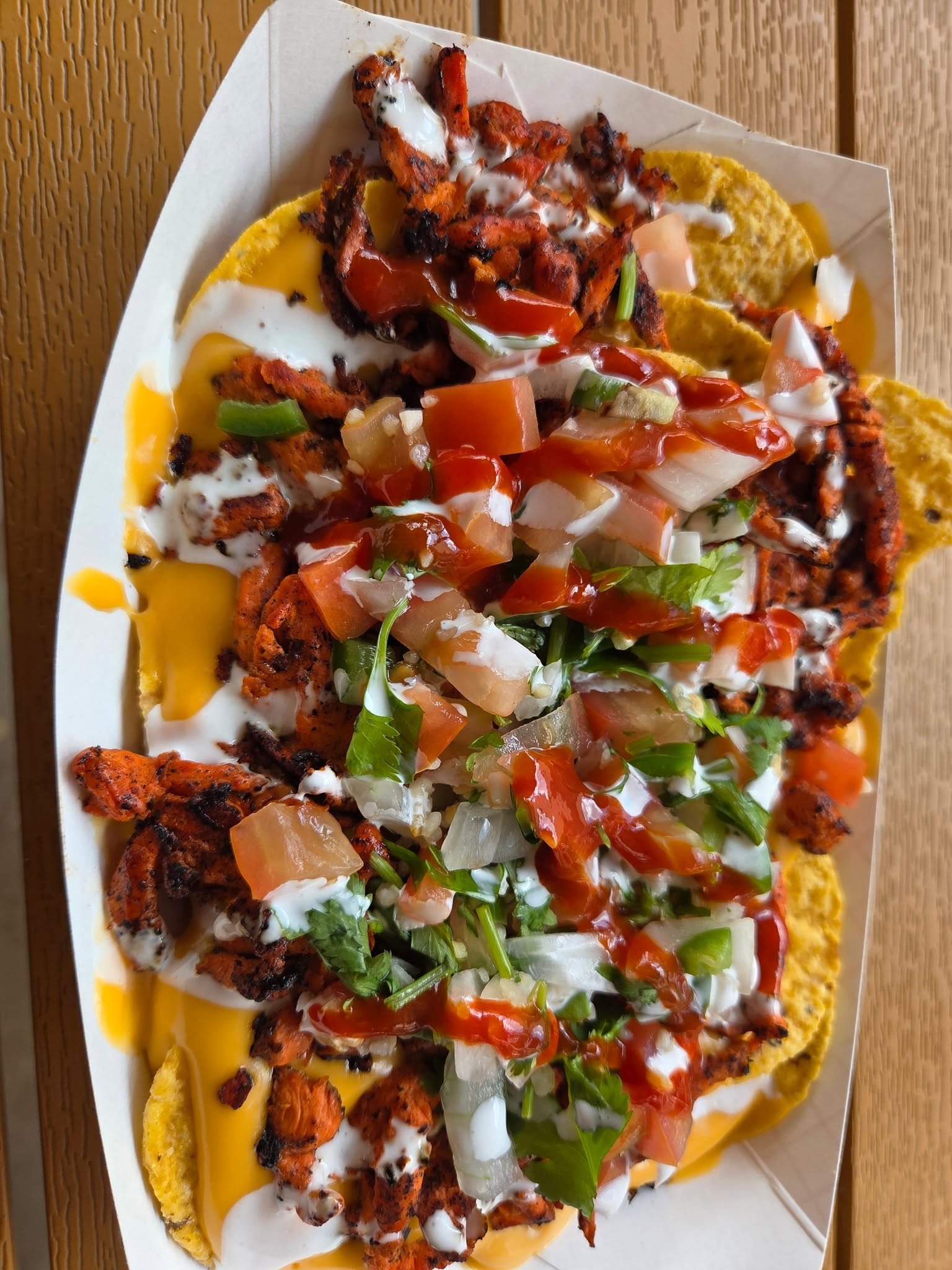 Employee meal before opening. Chicken fajita nachos, topped with our fresh house made pico, crema, and yellowbird Blue Algave Sriracha hot sauce!
We will open at 5pm today with our SmashBurgers, Beef, Chicken, and Pastor Tacos or Nachos, and SMOKED E
