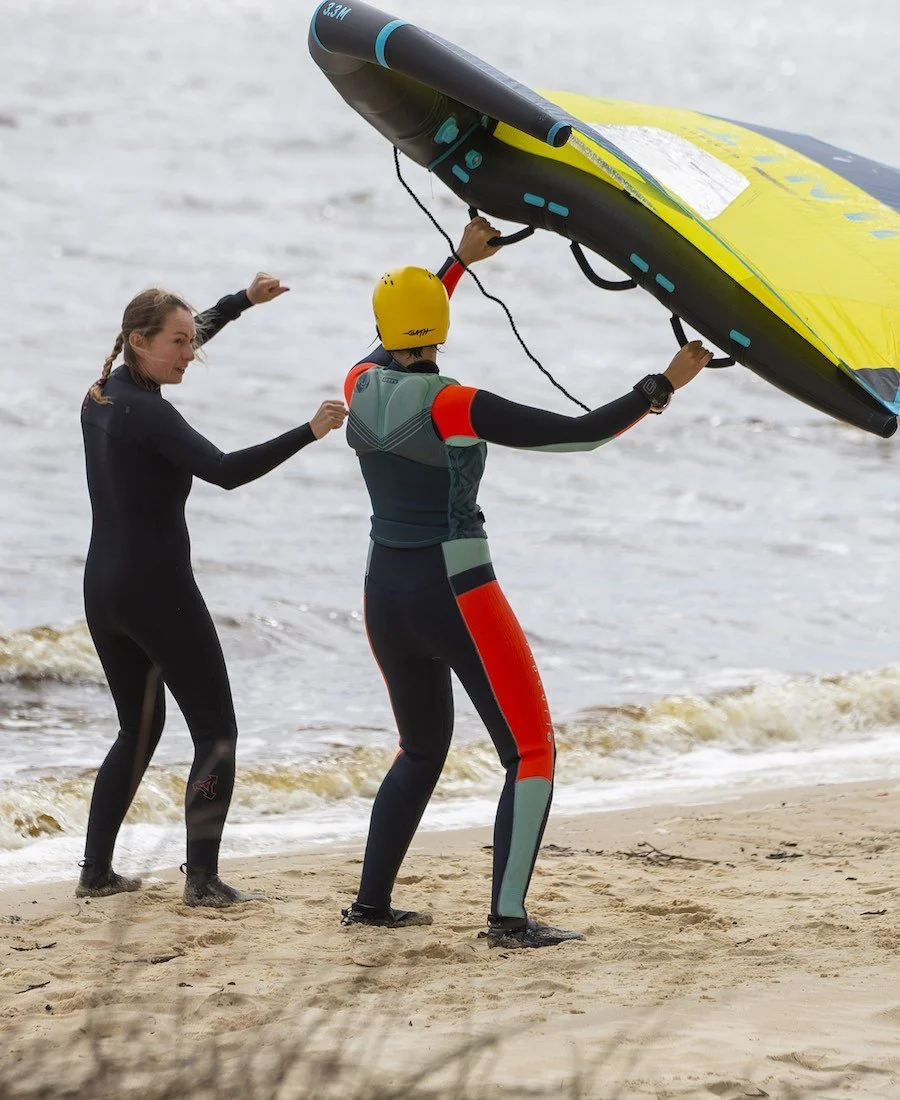 wing-foil-lesson-king-wing-instructor-anna-the-foil-shop-private-lesson-girl-beach-900x1100-1.jpg