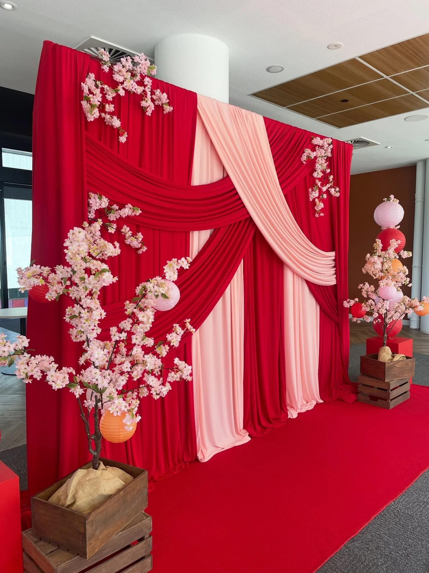 A mix of modern and traditional styling and drapery for the @unilodgecurtin photo backdrop ready for their events! 🏮🏮🏮