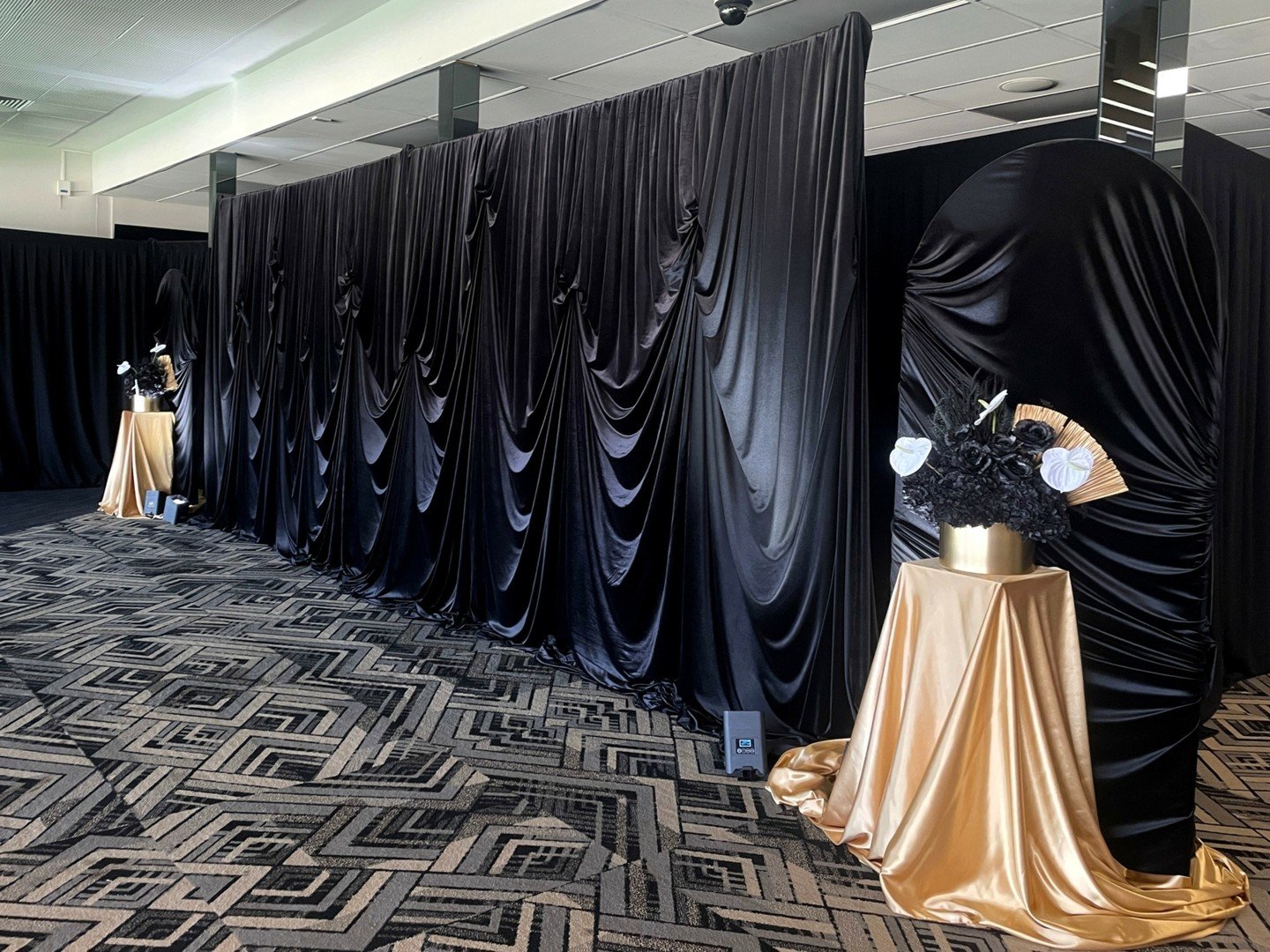 Black velvet is fast becoming a favourite! We created this luxe 6 metre long drapery backdrop with swag style effect for @taylorweirperth Gala night @ascotracecourse &hearts; 

Along with our arch backdrops, silky gold draped plinths and coordinating