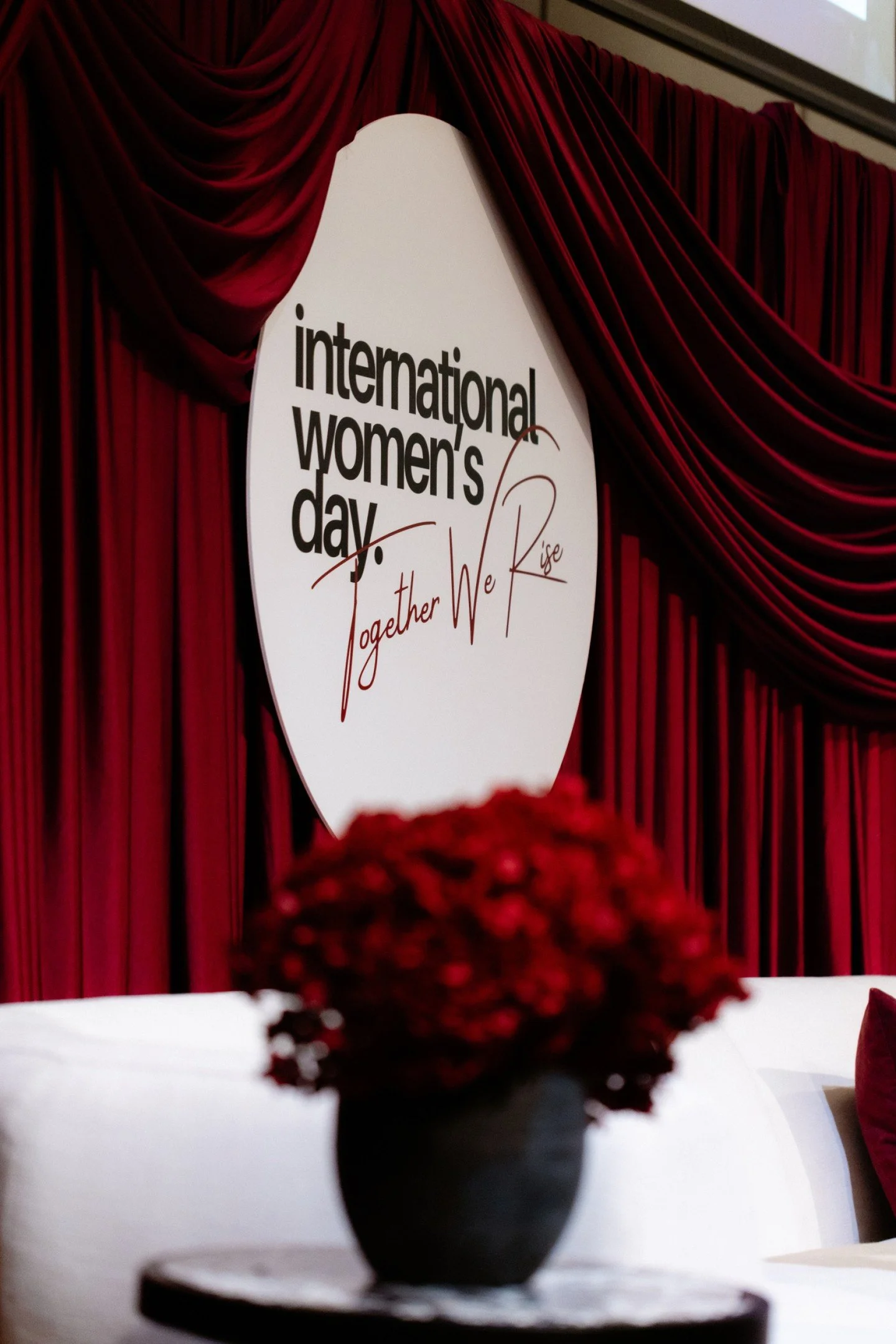 It was a pleasure to collaborate with @ashmatkovic and @brookevolinovich for this year's @internationalwomensdayevent styling. Over six metres of burgundy backdrop for the stage, along with our signature mocha mousse backdrop for the foyer media wall