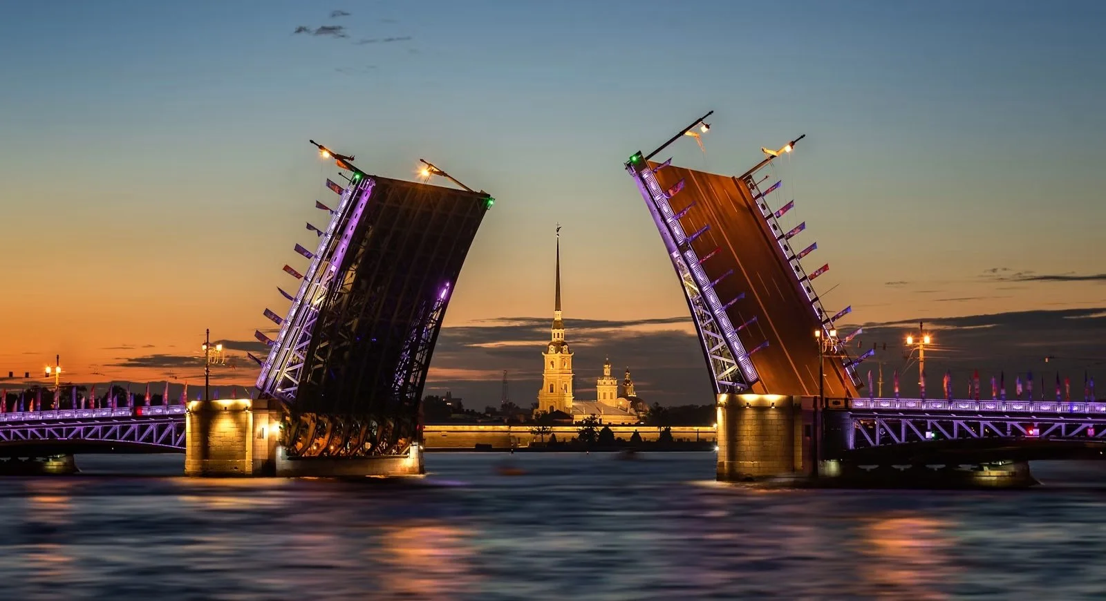 Raised bridge over the Neva River in Saint Petersburg on a white night.