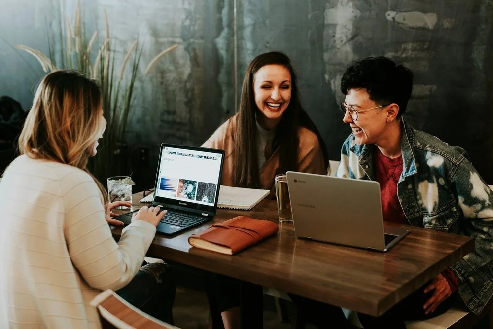 Graduate reviewing study records for Post Graduation Work Permit Consultant North York support