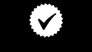 White badge with a checkmark on a black background