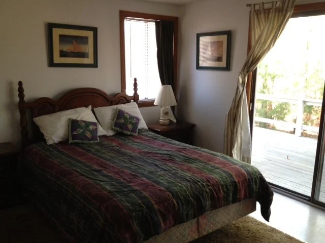 The master bedroom is located downstairs on the right.