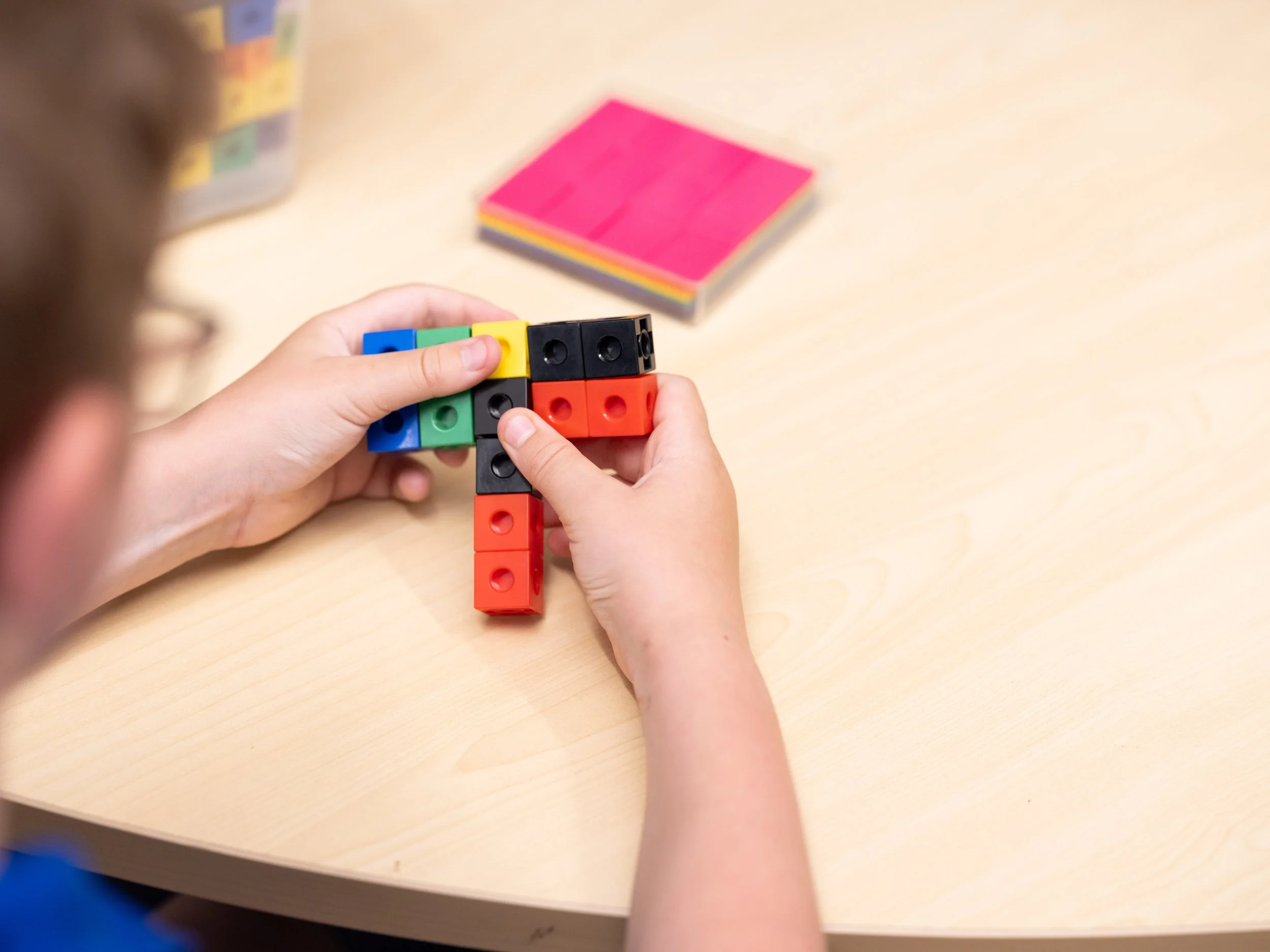Kid playing with lego