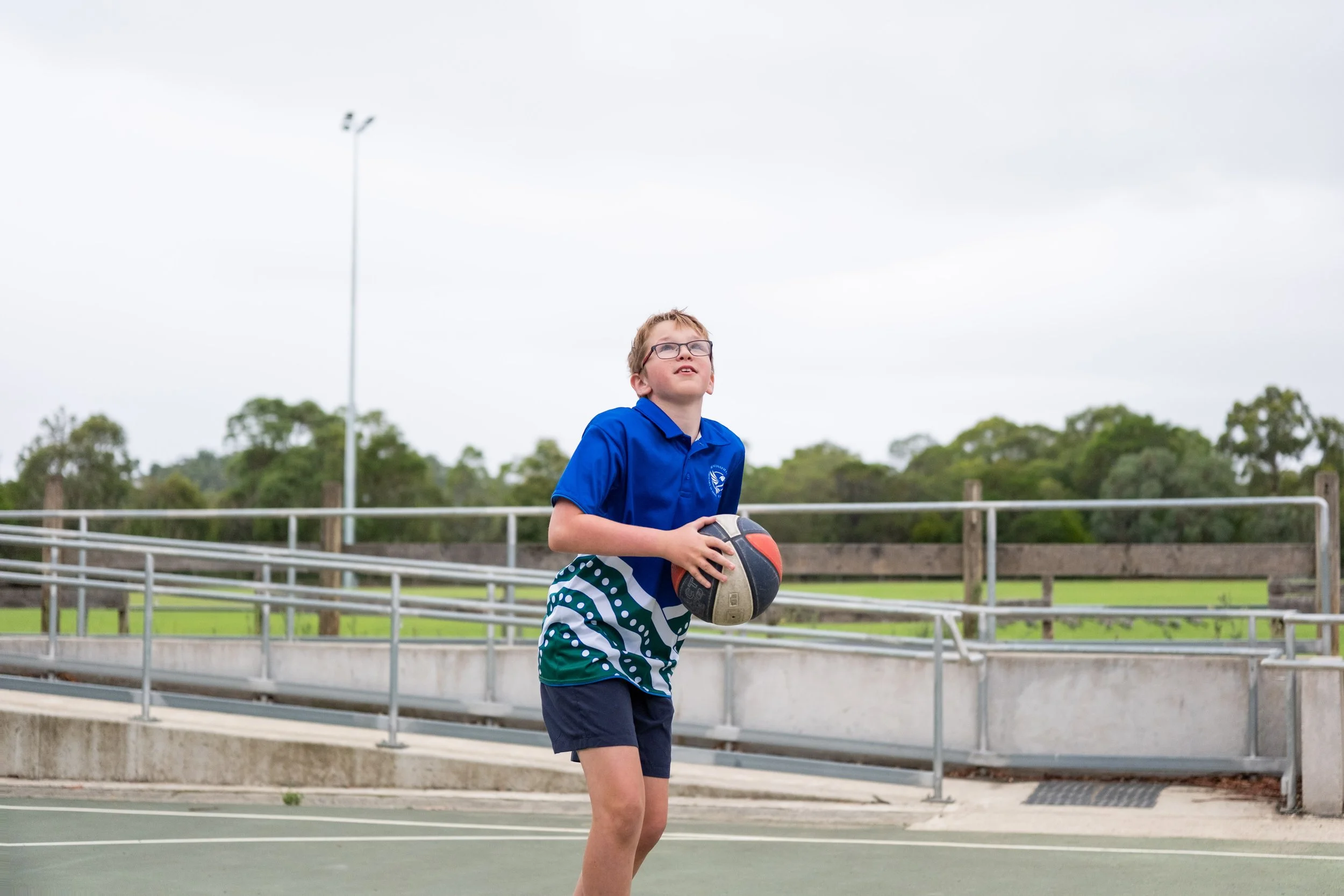 kid playing basketball