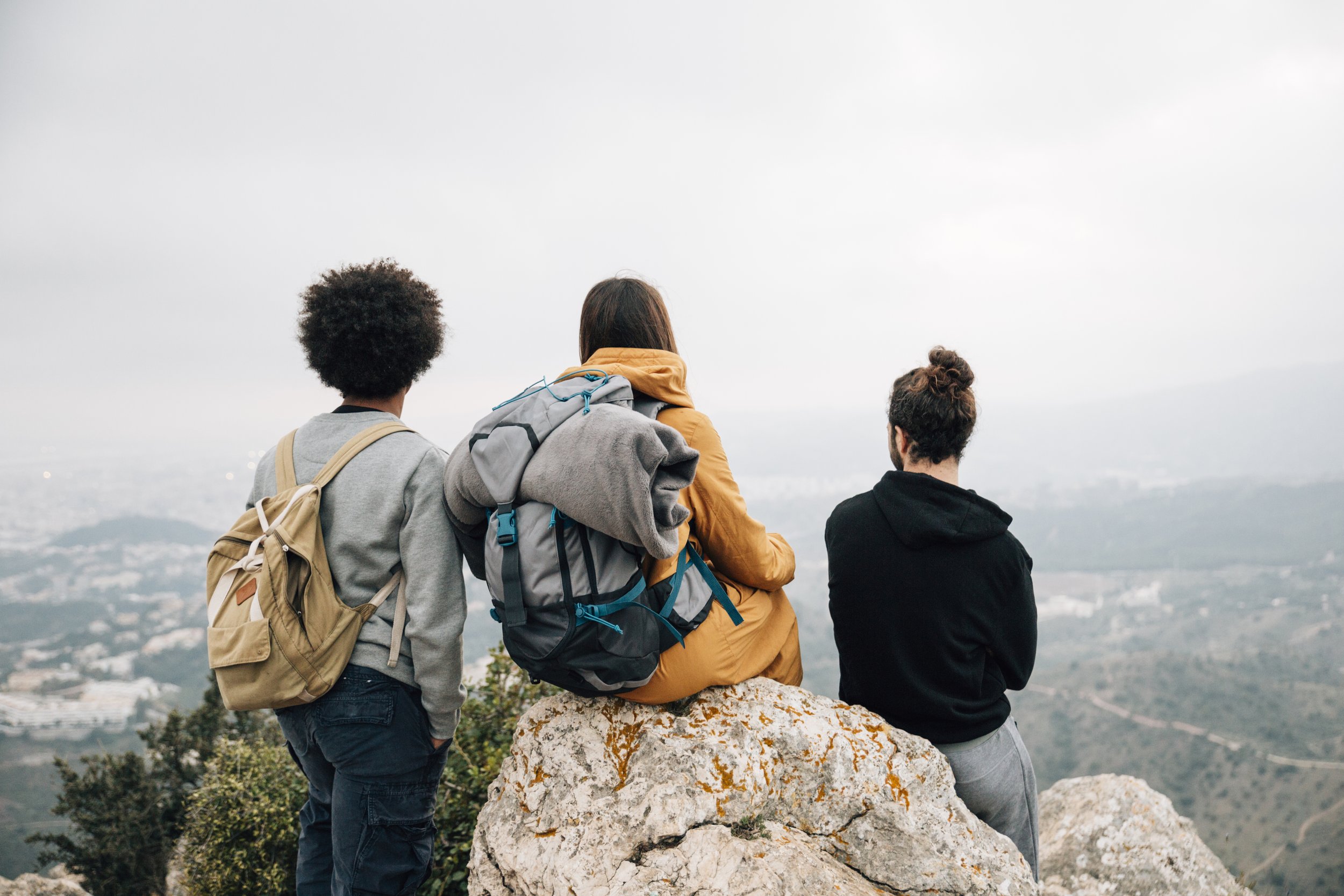 rear-view-male-female-hiker-overlooking-mountain-view (1).jpg