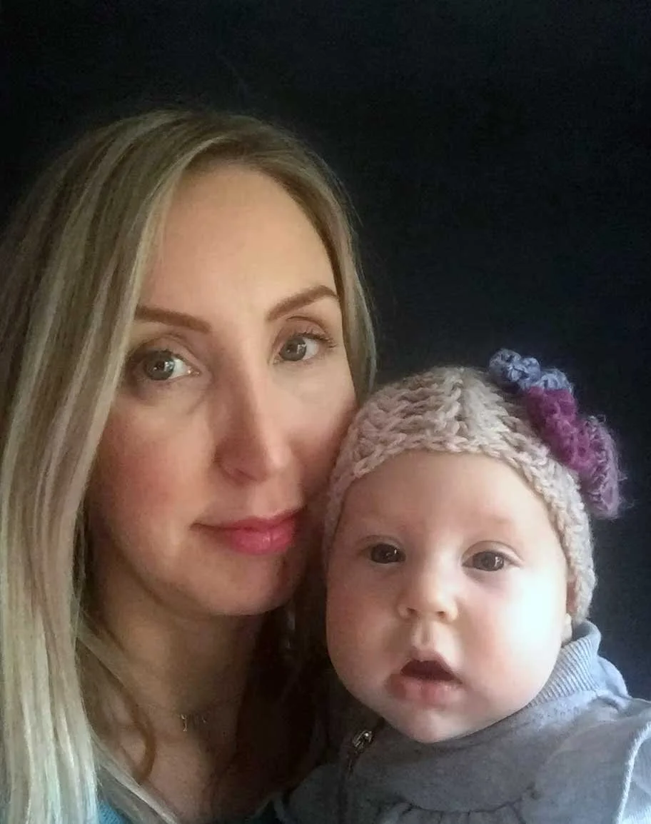 A midwife holding a baby