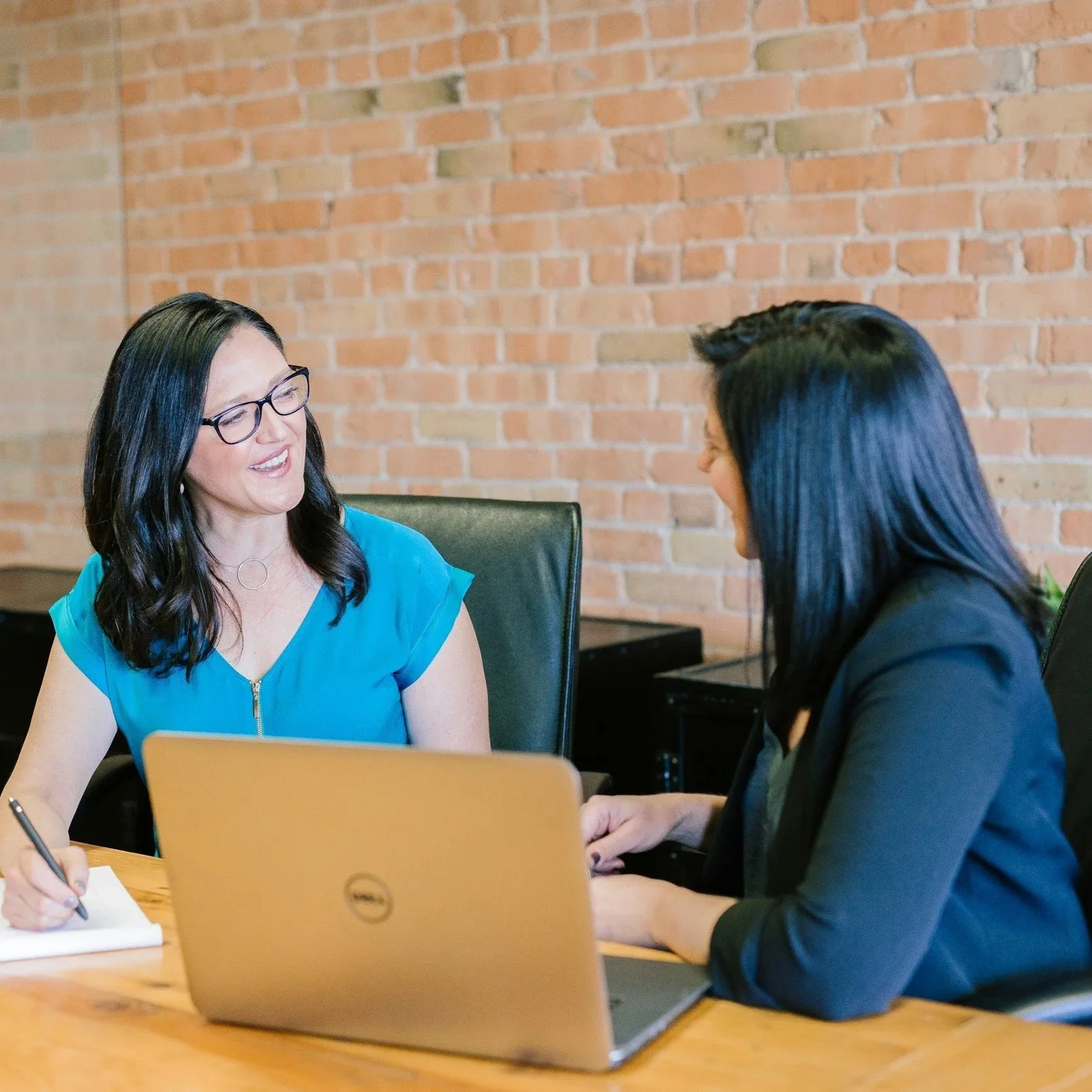 Two women in consultation meeting. Service consultation with teacher, home educator, author, autism advocate on homeschooling or autism.