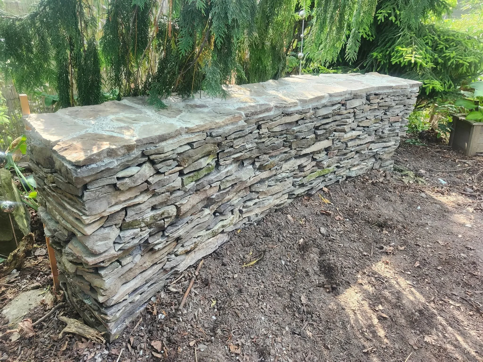 Boston Masonry services - Outdoor Stone Wall.jpg