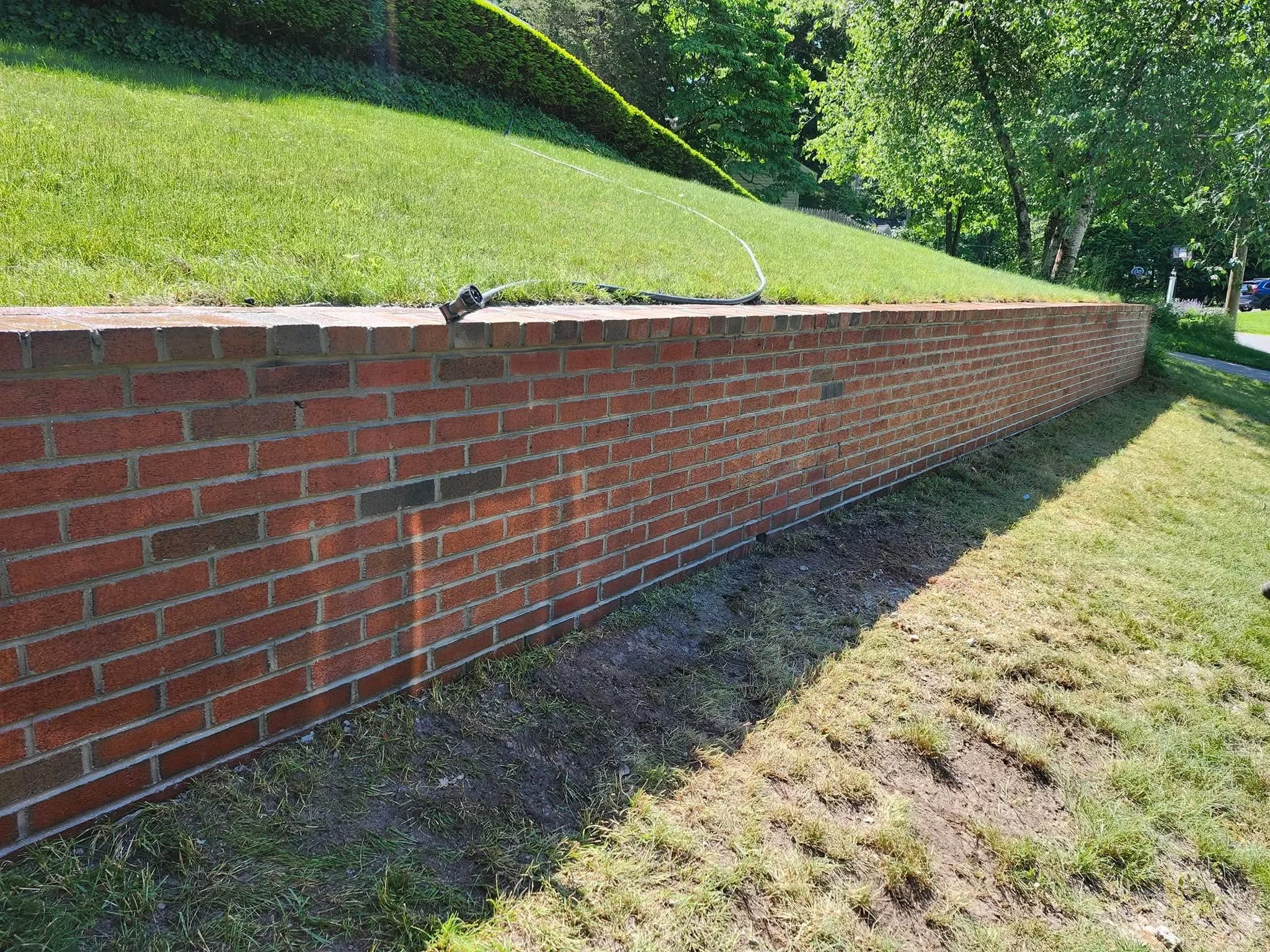 Brick wall Building, Repair, and Repointing.jpg