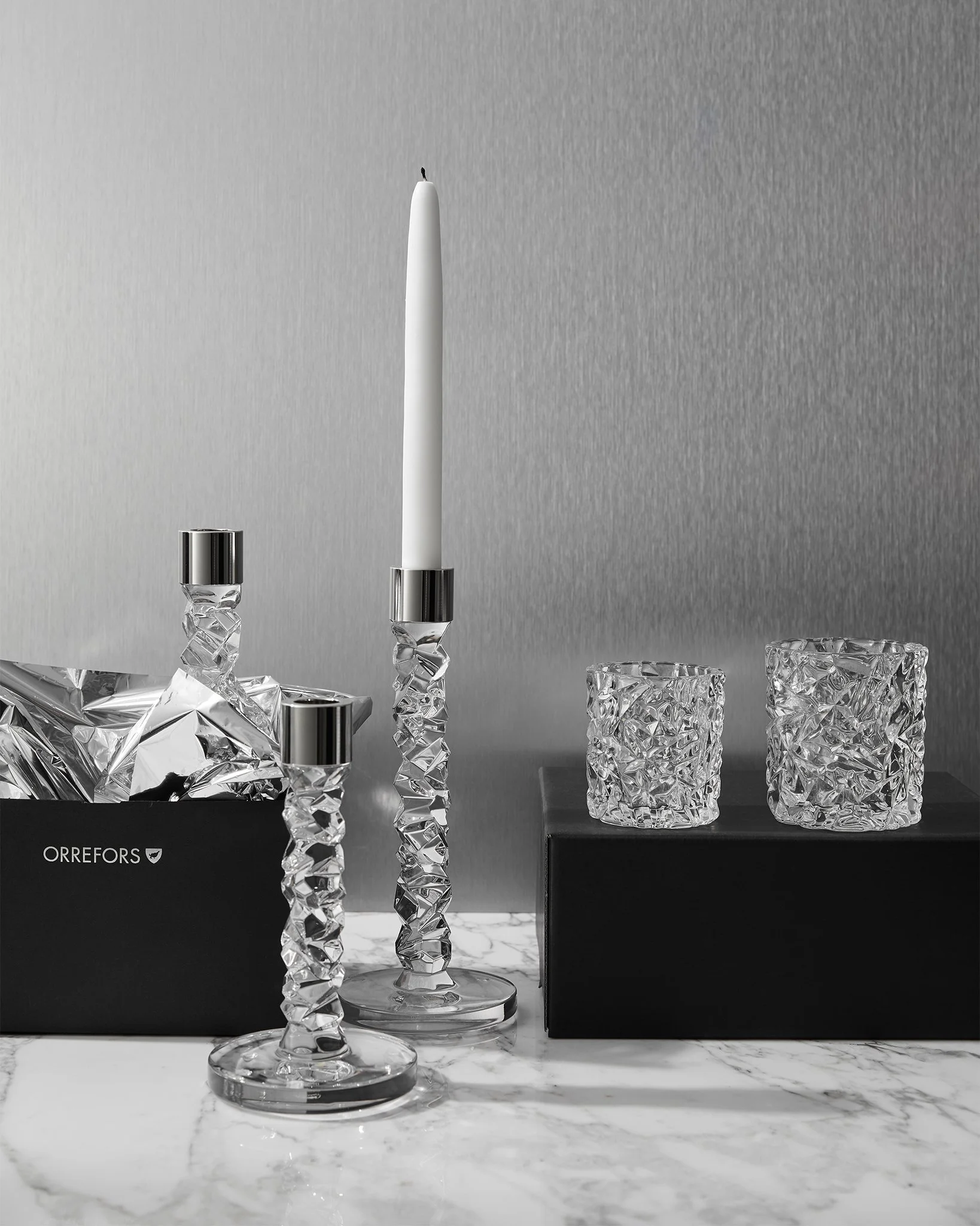 6590171_6590172_6590165_6590162_Carat_Votive_Candlestick_Orrefors_Lena-Bergstrom_ENV_Giftgiving_2024_01.jpg