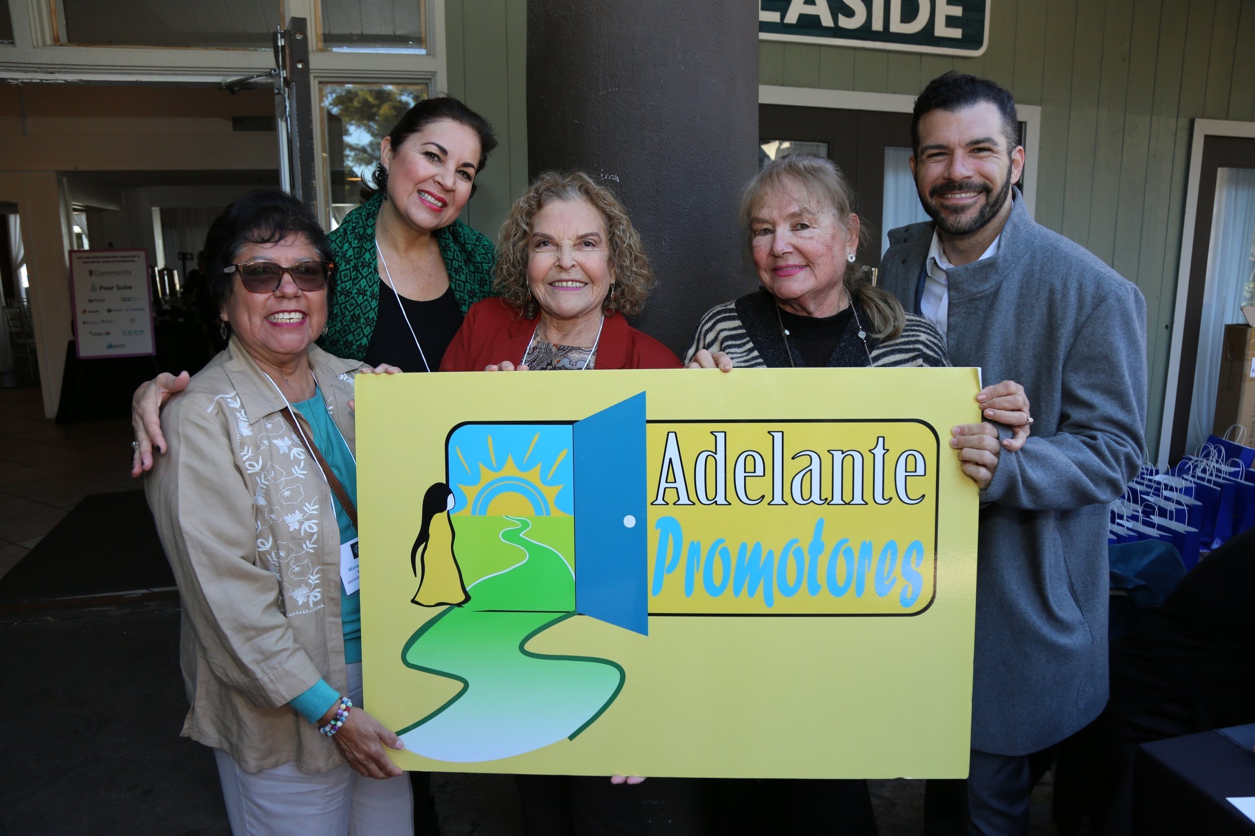 Group of people attending an educational event in San Diego, engaging in learning and community activities.