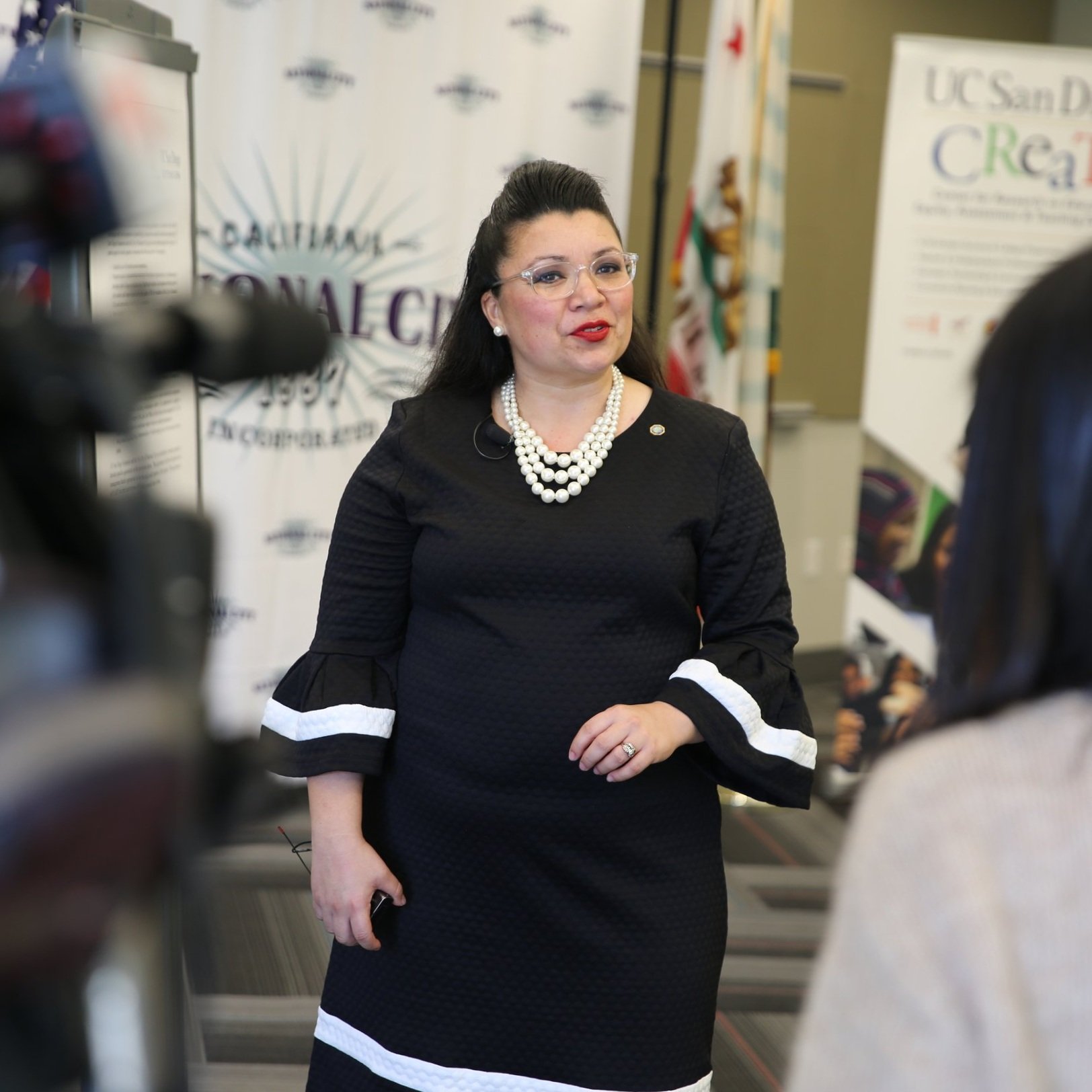 National City mayor being interviewed about the UC San Diego CREATE event, highlighting community efforts in San Diego.