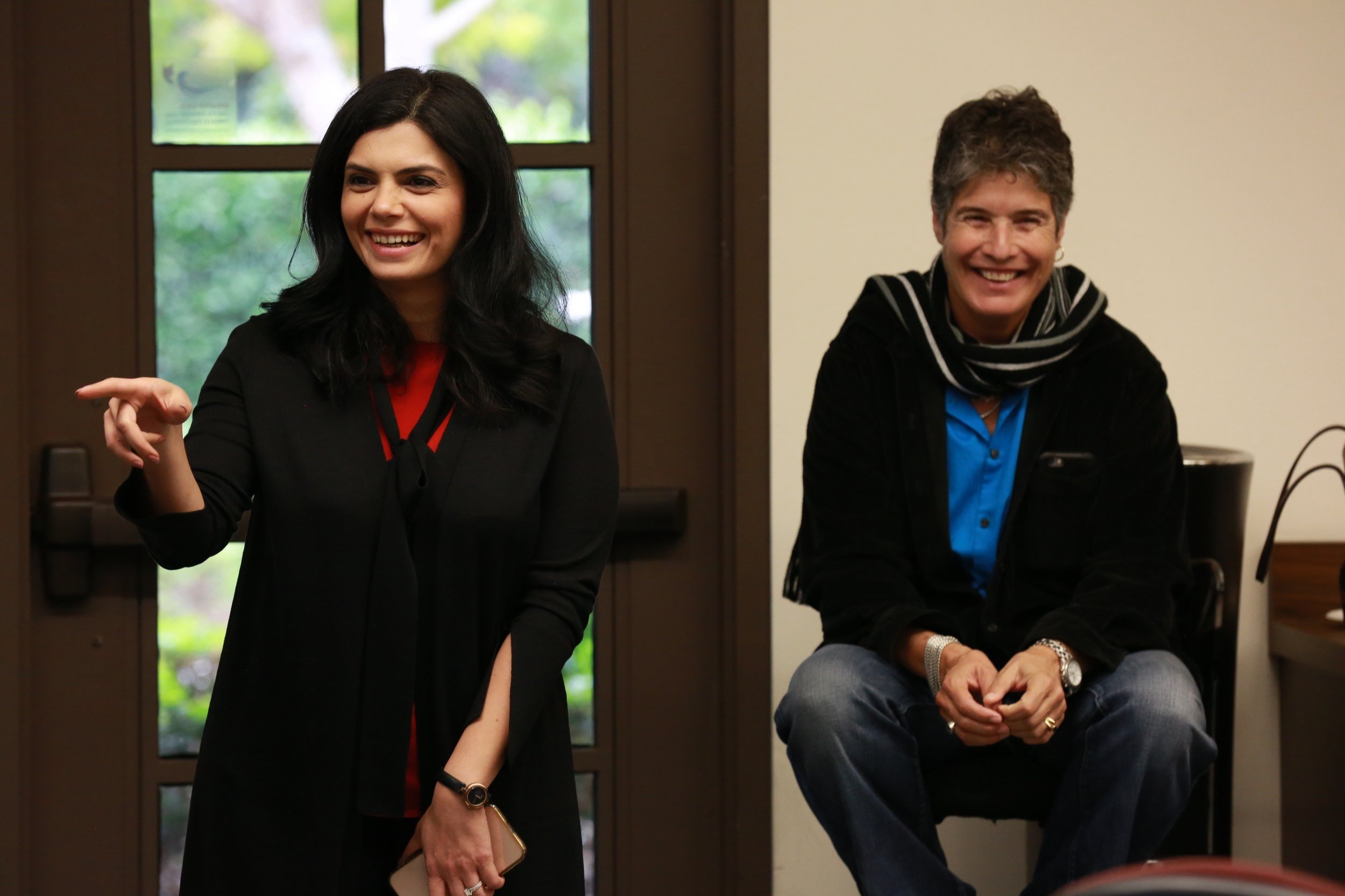 Two women participating in a workshop at RISE San Diego, engaging in professional development and community building.