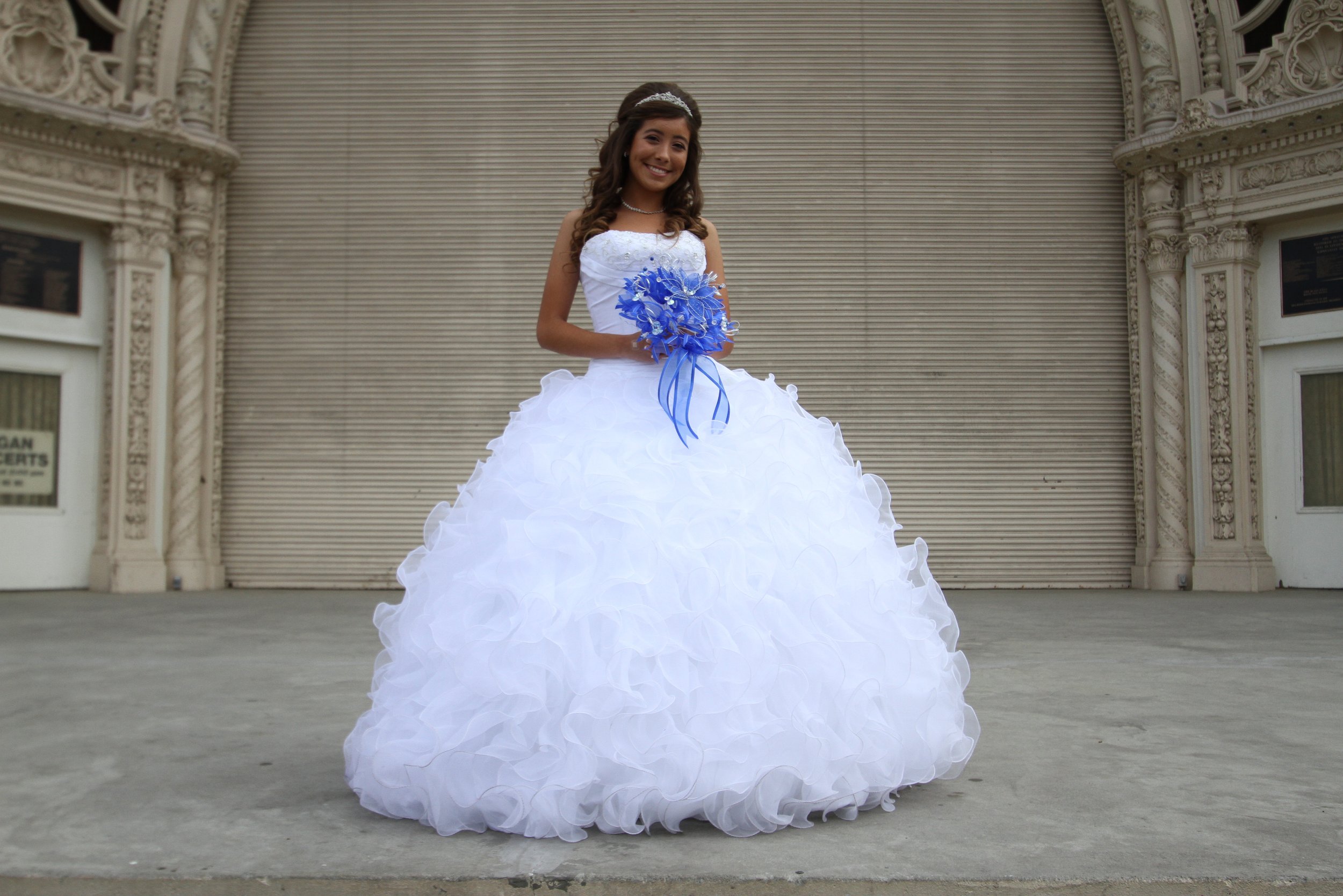 Quinceañera photoshoot at Balboa Park in San Diego, capturing beauty and celebration of a milestone in a scenic outdoor setting.