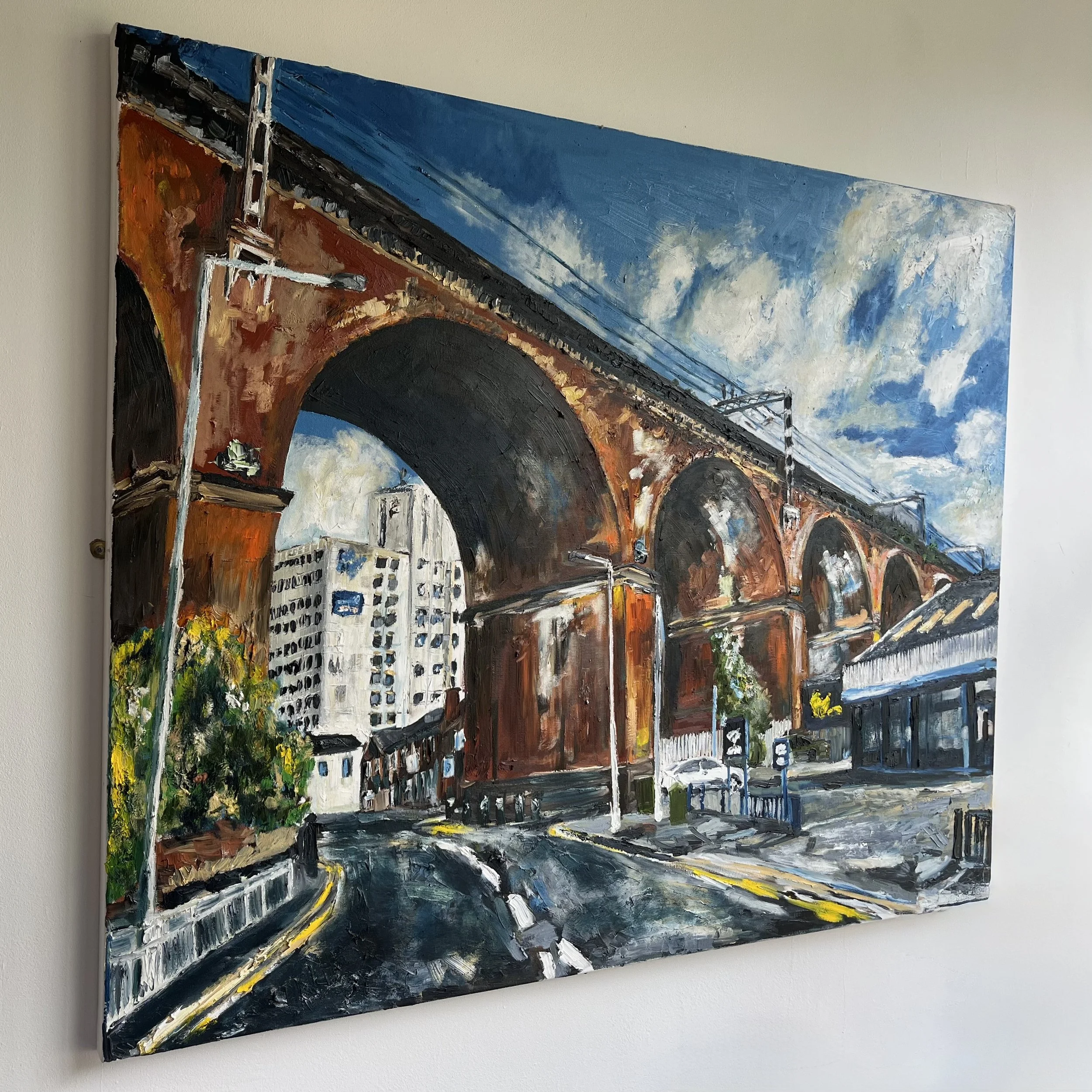 Side view of painting Stockport viaduct by artist Chaz Newton-Smith, oil on canvas.