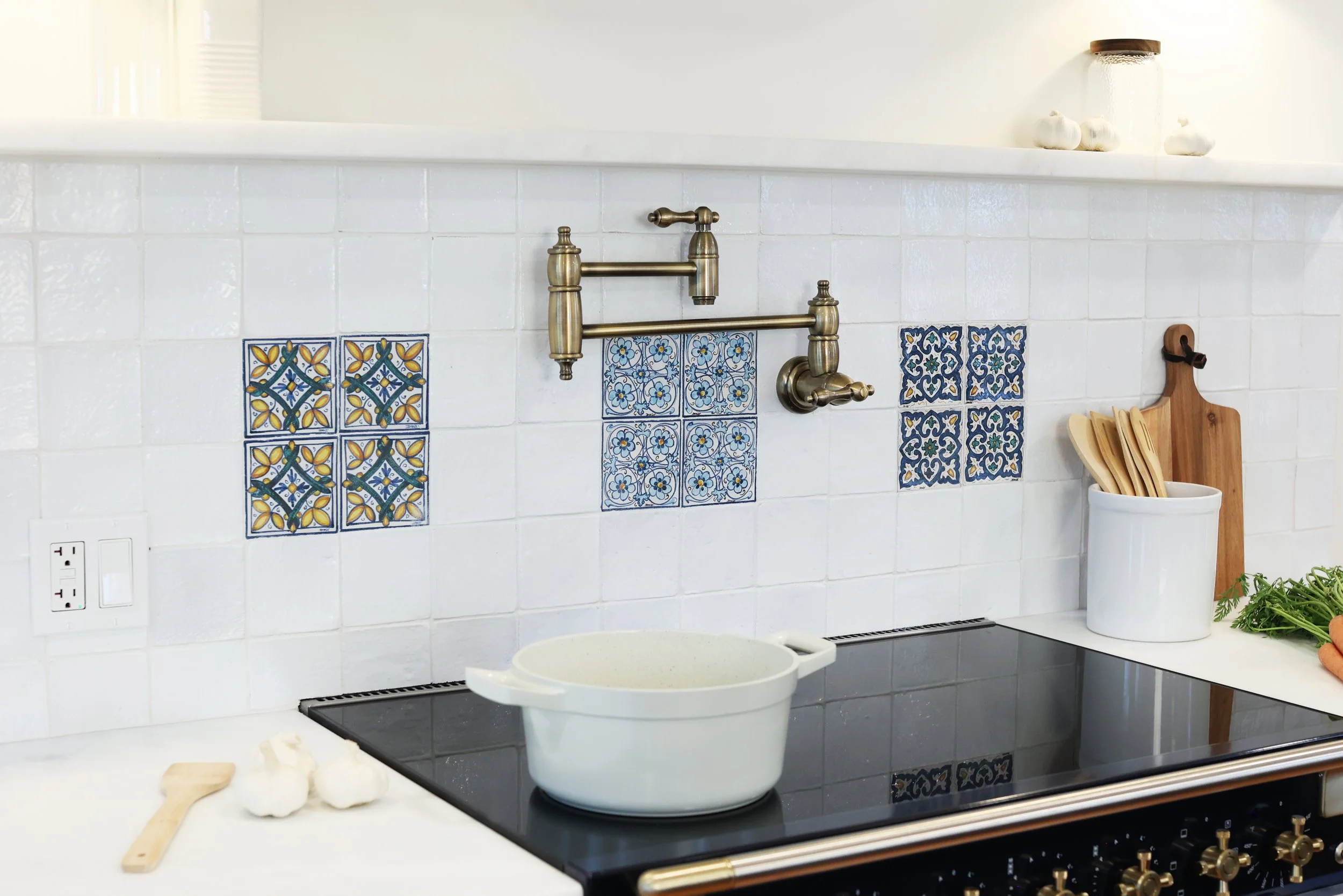antique brass pot filler over handcrafted white zellige tile backsplash in a Vermont kitchen renovation.