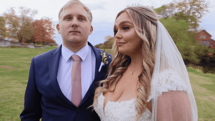 Chelsea's clients, Erika & Jordan Schwartz, posing on their wedding day