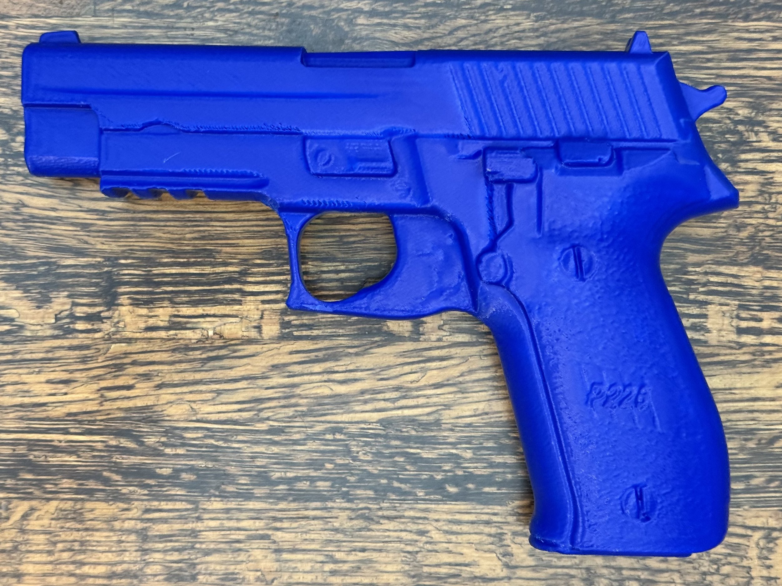 Sig Sauer P226 MK25 physical replica, non-functional inert training pistol for safe handling, holster molding, practice drills, and display. Realistic dimensions for trainers, collectors, hobbyists.