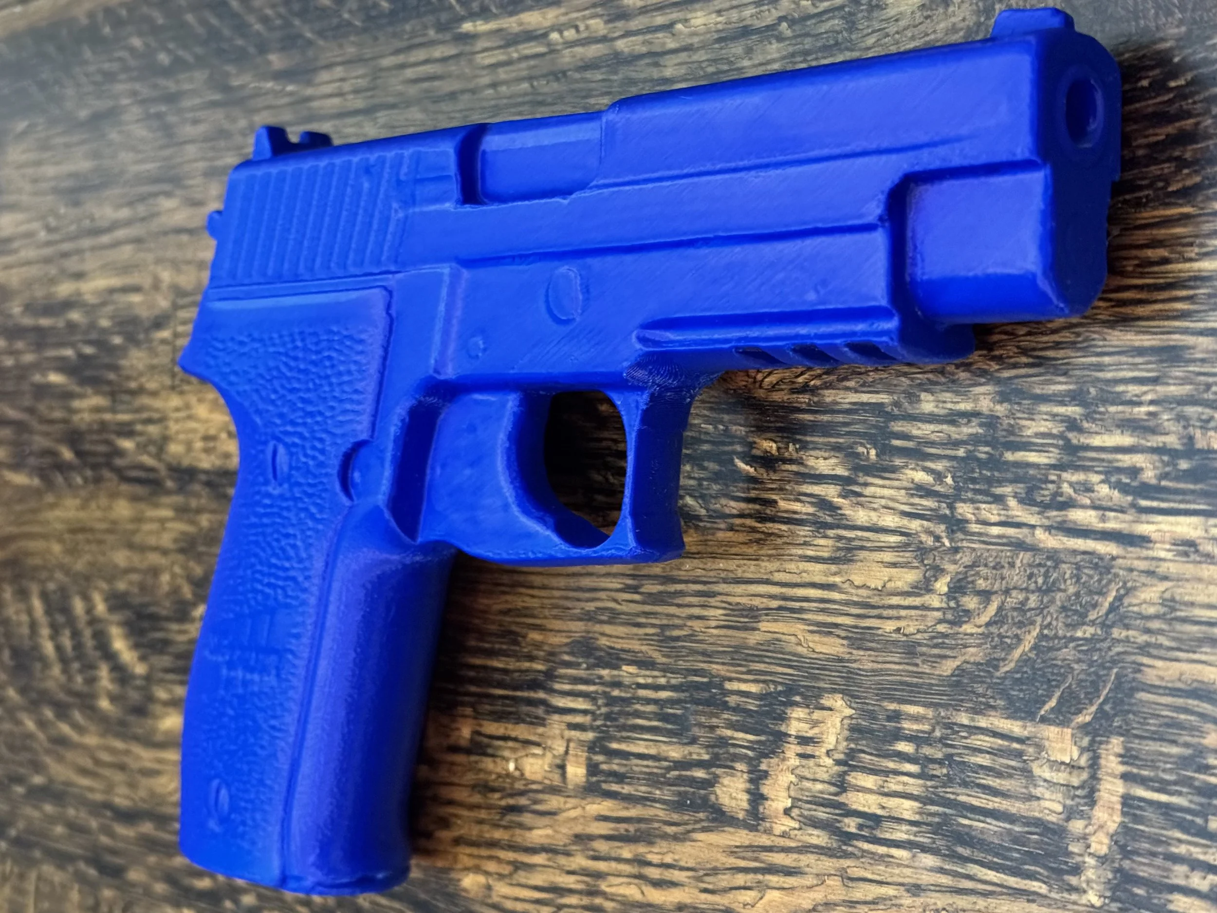 Sig Sauer P226 MK25 physical replica, non-functional inert training pistol for safe handling, holster molding, practice drills, and display. Realistic dimensions for trainers, collectors, hobbyists.