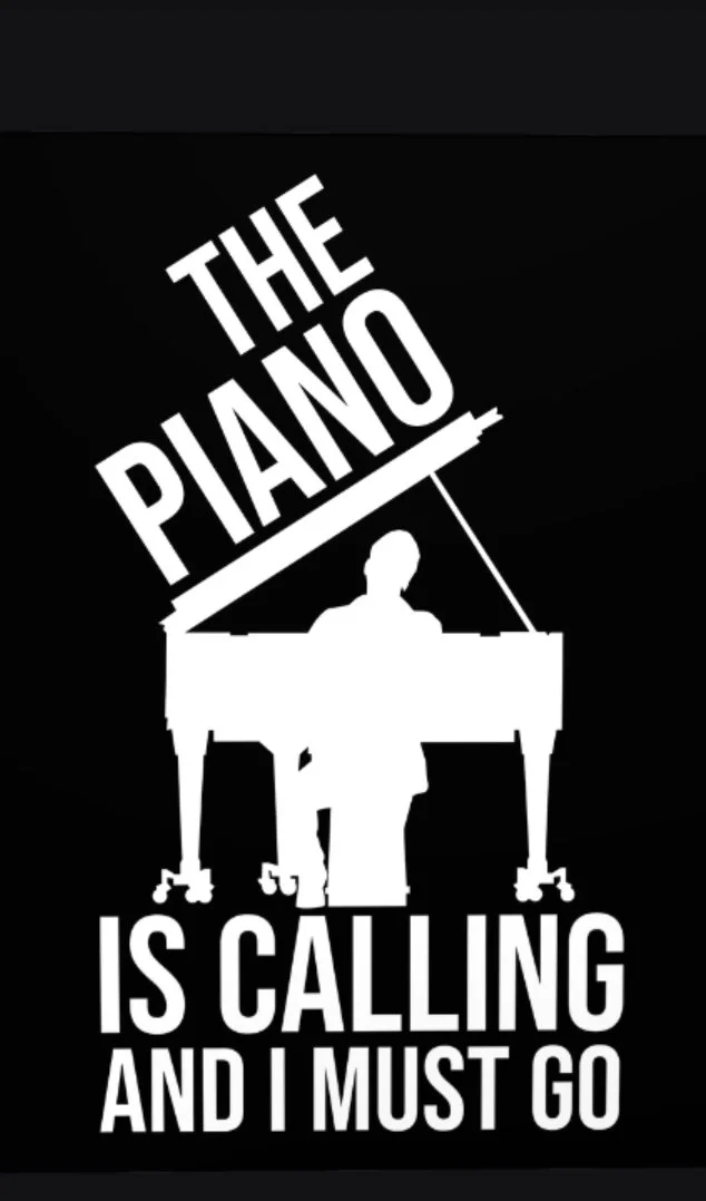 Silhouette of a person sitting at a grand piano with the words "The Piano Is Calling And I Must Go" in white text on a black background.