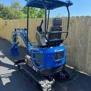Mini Excavator.  $260/Day