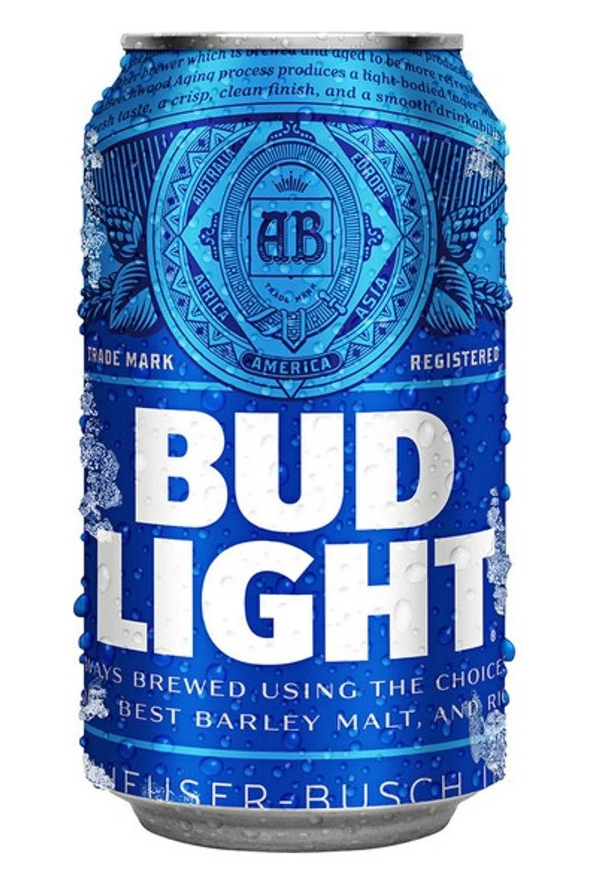 A blue Bud Light beer can with water droplets. The can features a large white text that reads "BUD LIGHT" and a detailed emblem at the top with the word "AMERICA".