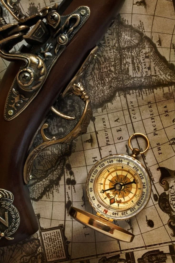 Steampunk Pistol and Compass on Map