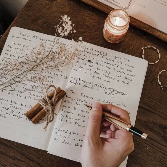 Journal with Writer's Hand