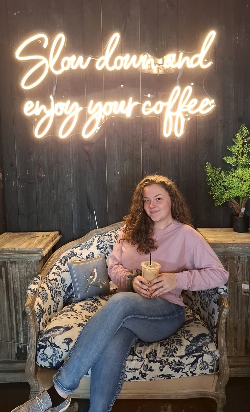 Author Smiling at Favorite Coffee Shop