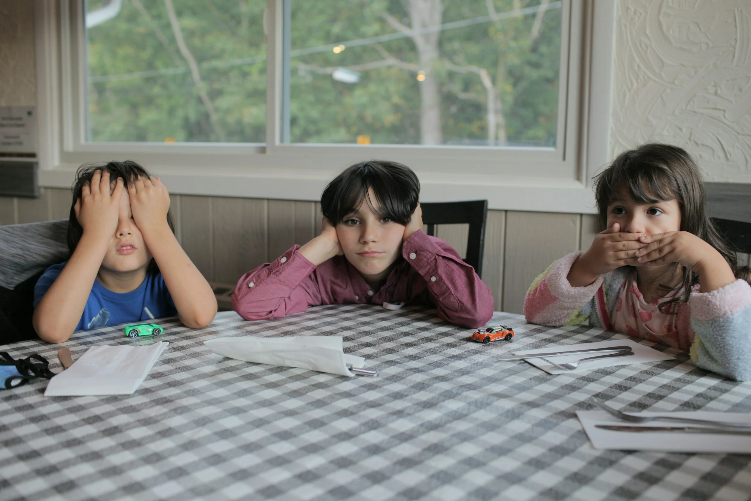 overwhelmed kids can show this through clinginess