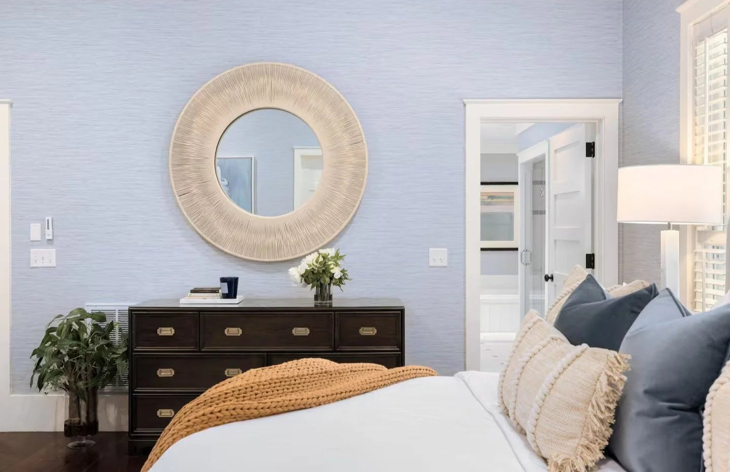 After: Master bedroom - New furniture and fresh wallpaper.
