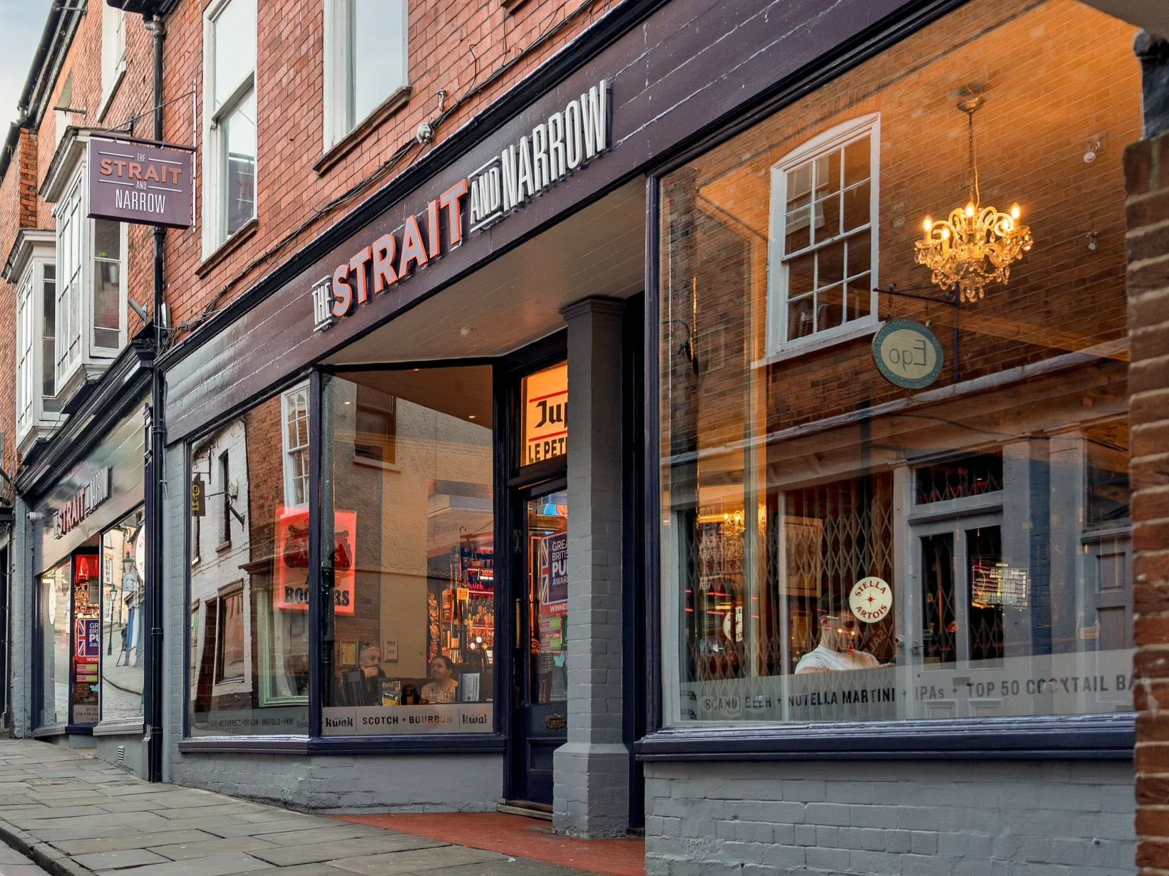 The Strait and Narrow IS the best bar in Lincoln. Located at the top of the High Street, bottom of Steep Hill, we're a short walk away from the train station and bus station, and right in the city centre. Come see us for the best drinks in Lincoln!