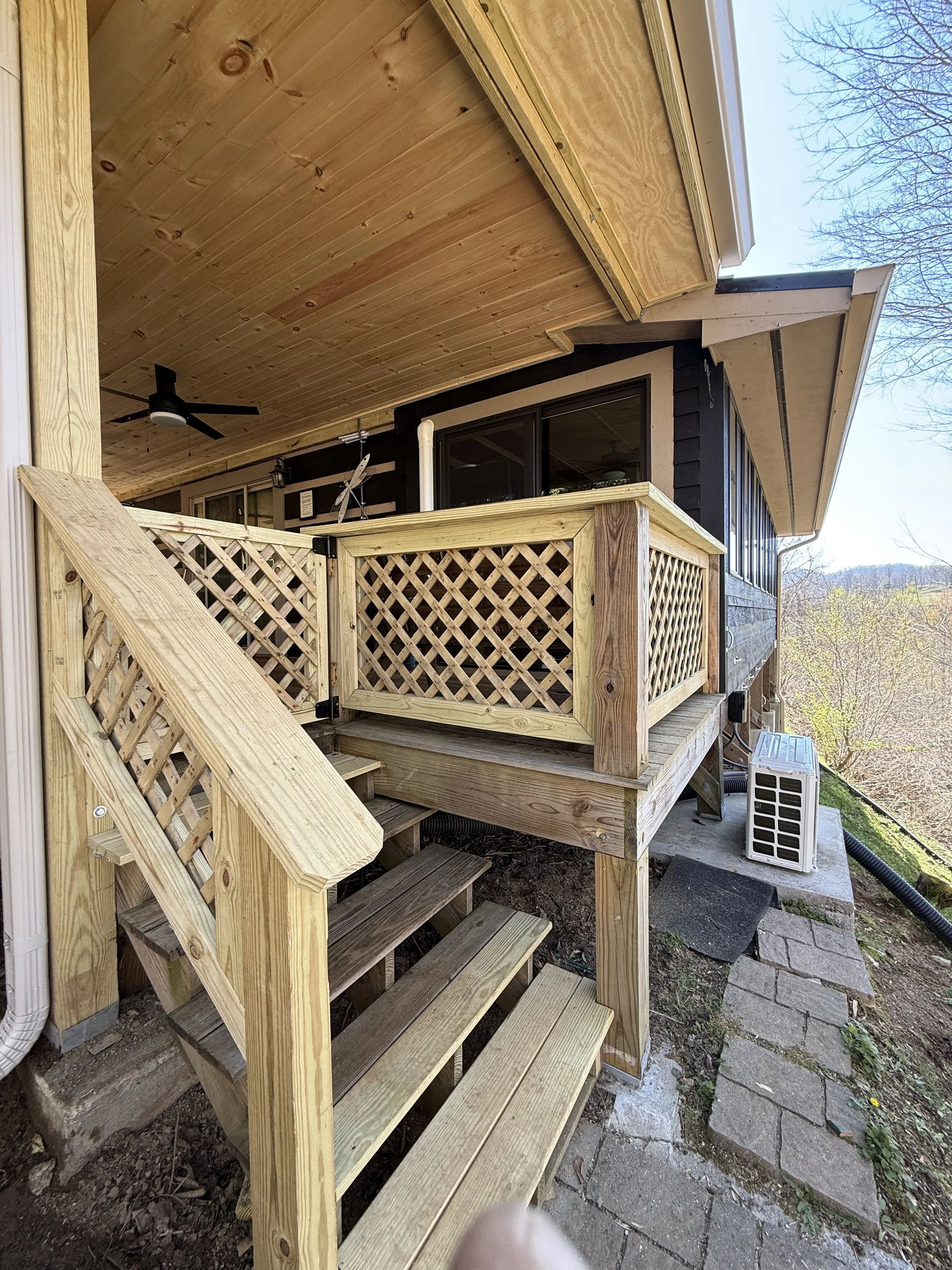 Beautifully renovated deck space with tongue and groove installed on the ceiling. Beautiful latticework and newly built staircase