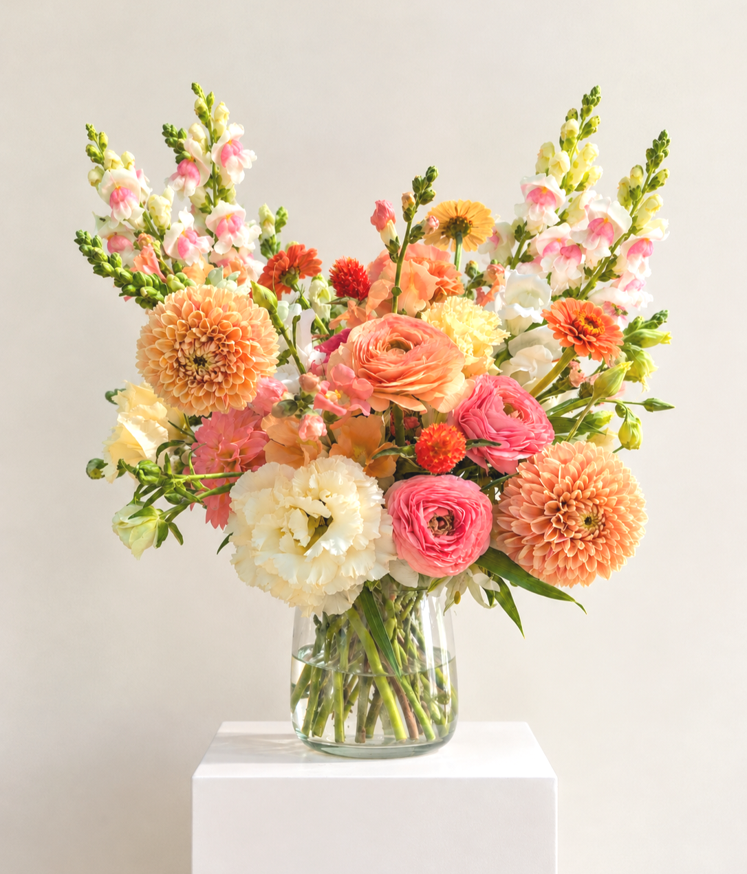 Peach+Garden+Bouquet+on+White+Pedestal.png