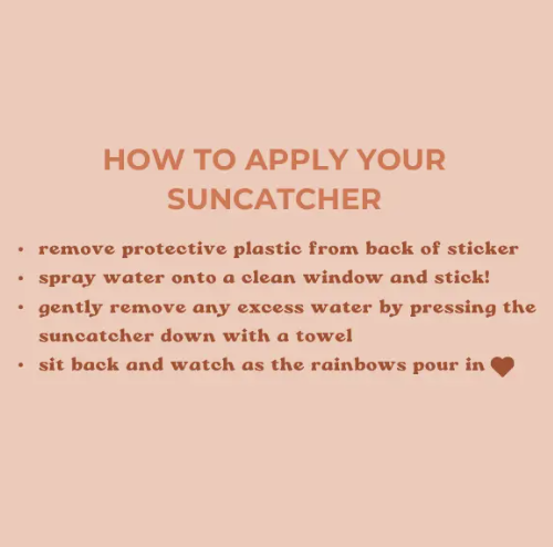 Step-by-step guide on applying a sun catcher to a window for optimal sunlight reflection and decoration.