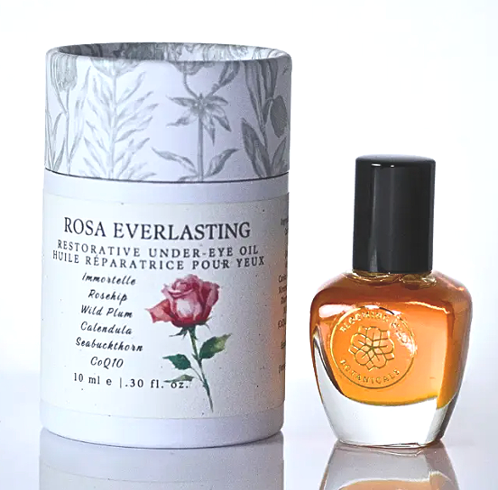 A bottle of rose everlasting perfume oil, elegantly designed, showcasing its floral essence and luxurious appeal.