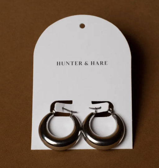 Stylish hunter and harlequin hoop earrings featuring a vibrant color combination, perfect for adding flair to any outfit.