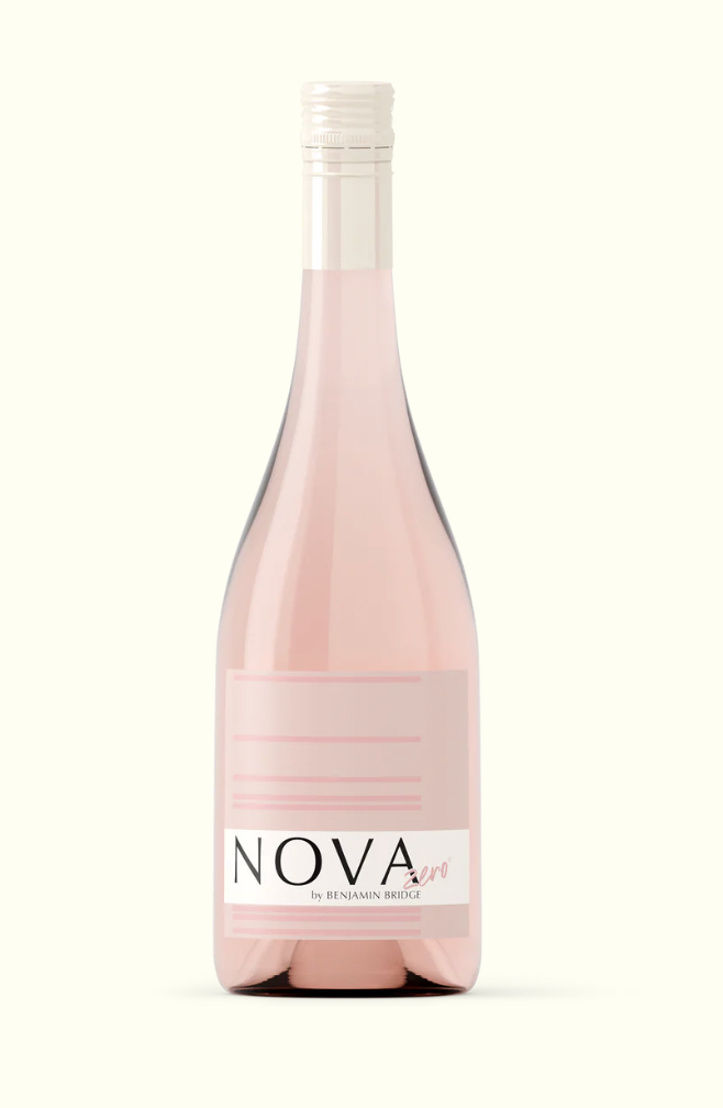 A bottle of pink wine stands upright against a clean white background.
