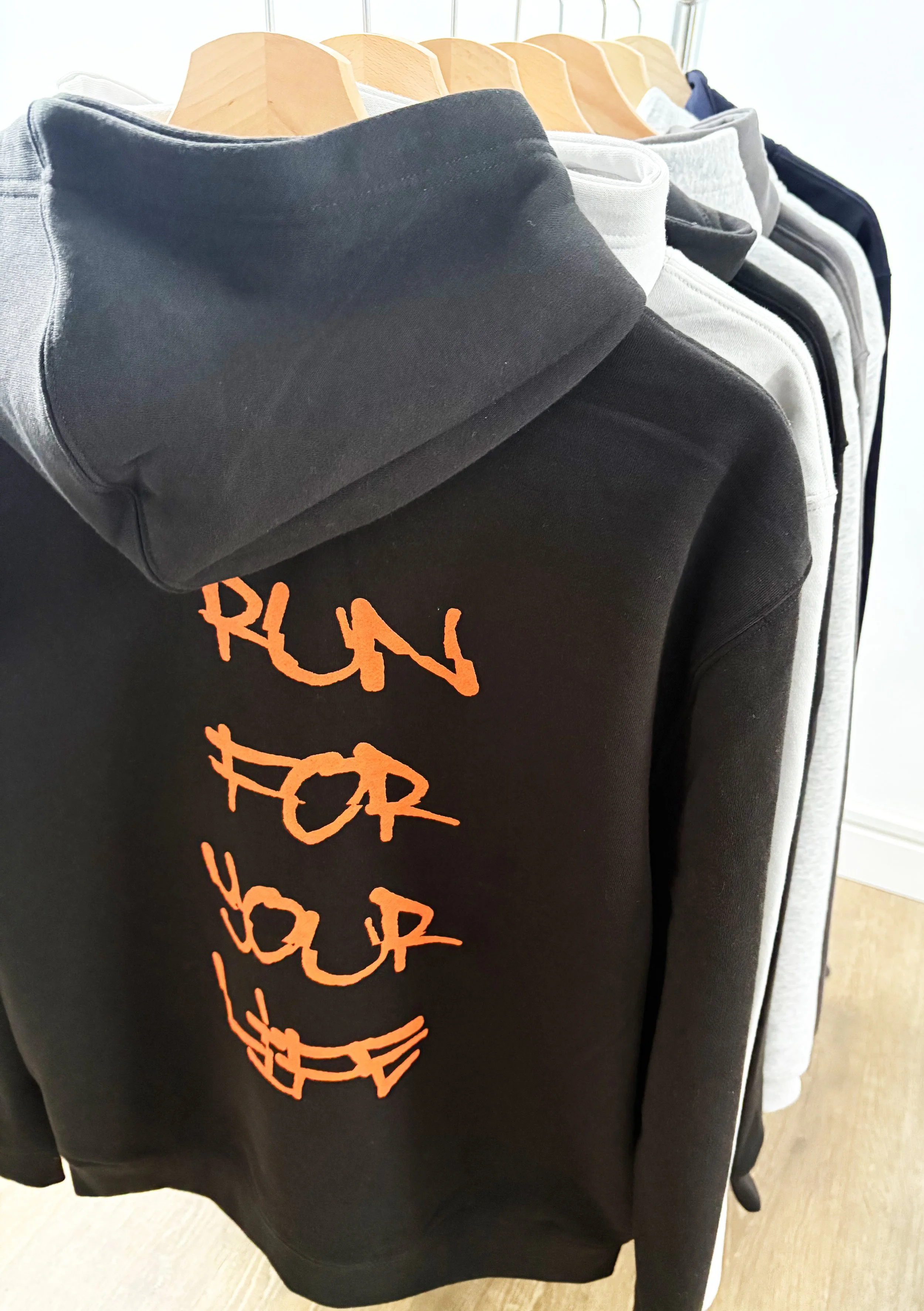 RFYL hoodie black rack.jpg
