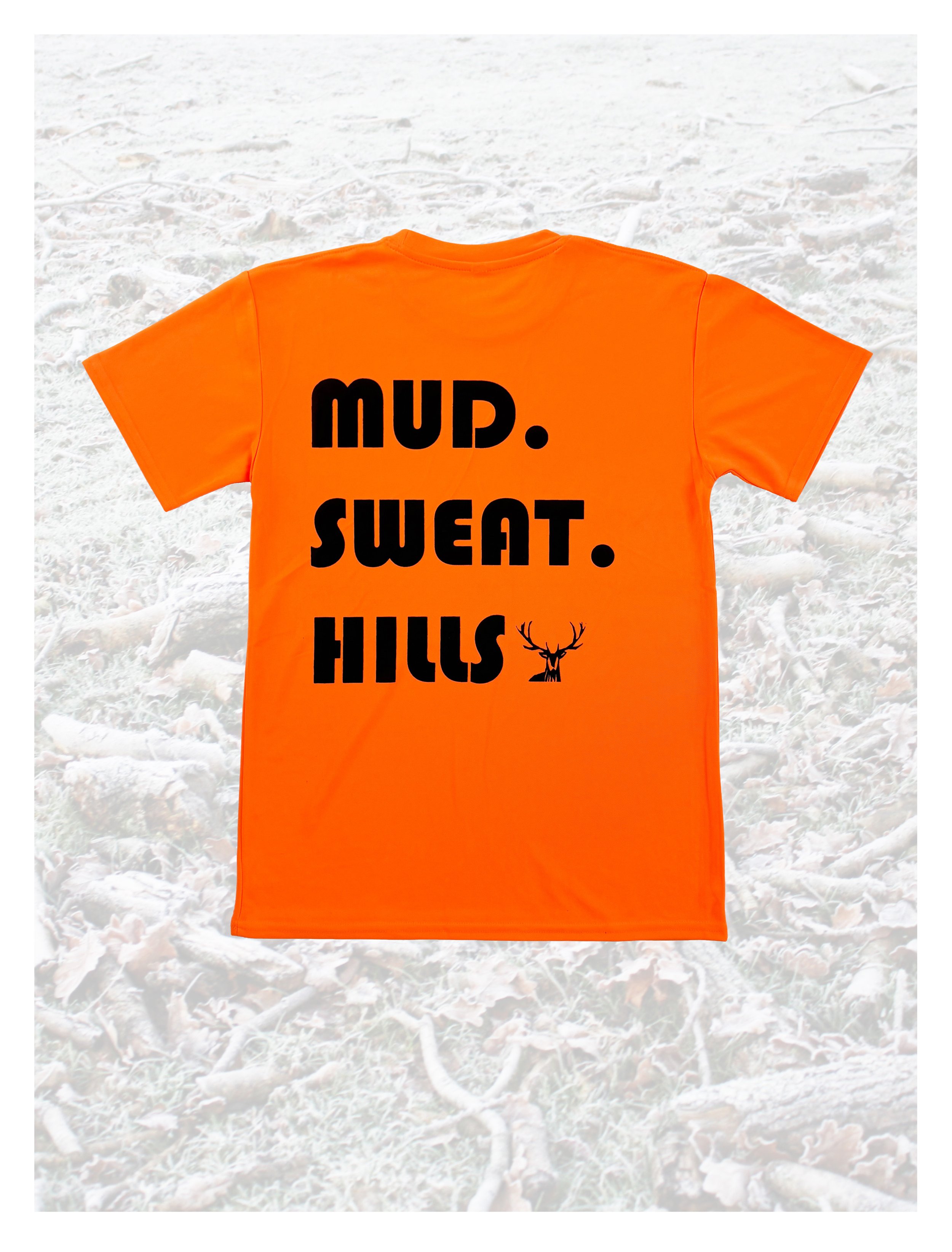orange tech t-shirt printed with bold black text, mud sweat hills, lying flat against a pale background