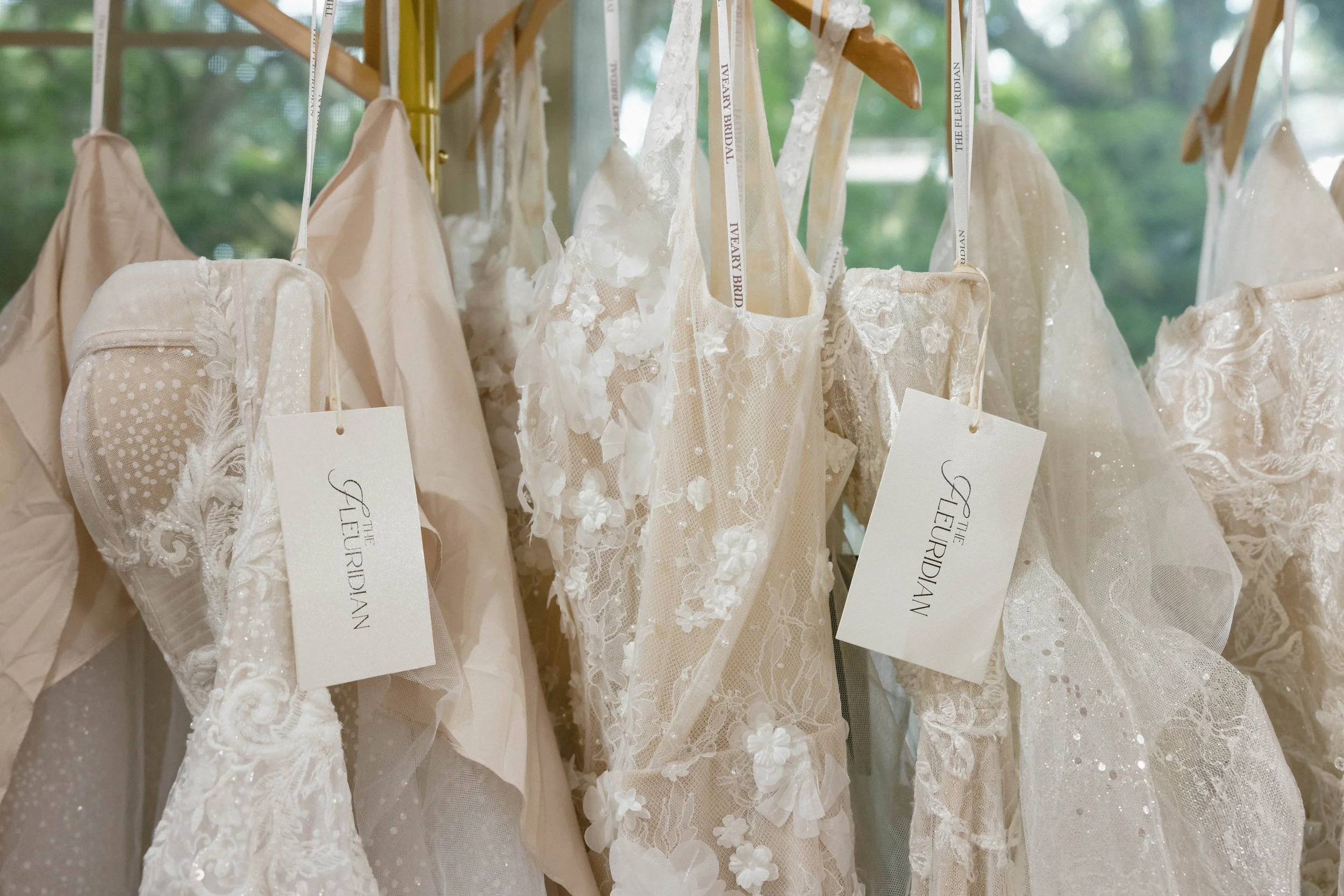 Gainesville Boutique Bridal Shop  Plus size inclusive Designer wedding gowns Ocala  Jacksonville  Wedding dress Florida  Alachua  Reception dress Graduation dress Little white dress Bride Veils Lgbtq friendly  salon north central florida