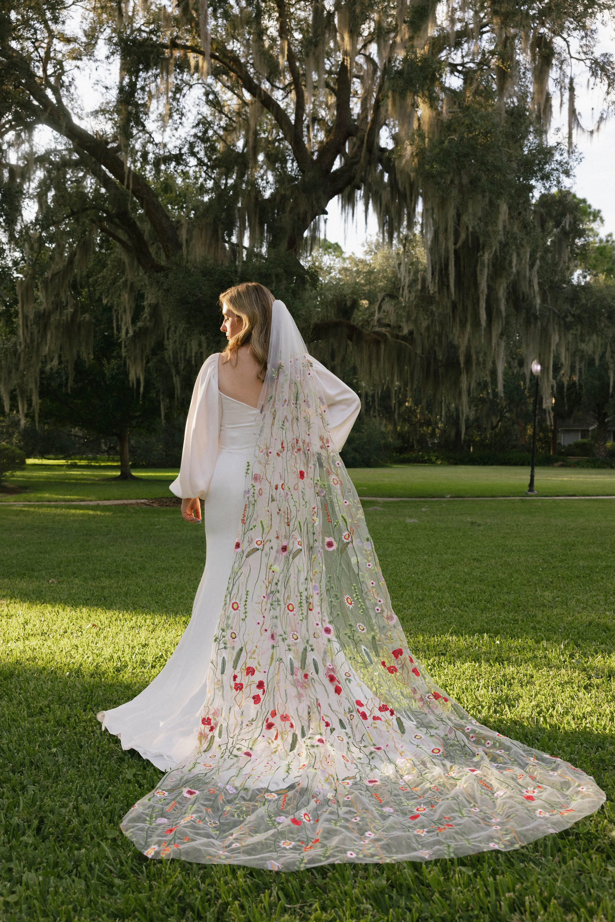 vGainesville Boutique Bridal Shop  Plus size inclusive Designer wedding gowns Ocala  Jacksonville  Wedding dress Florida  Alachua  Reception dress Graduation dress Little white dress Bride Veils Lgbtq friendly  salon north central florida